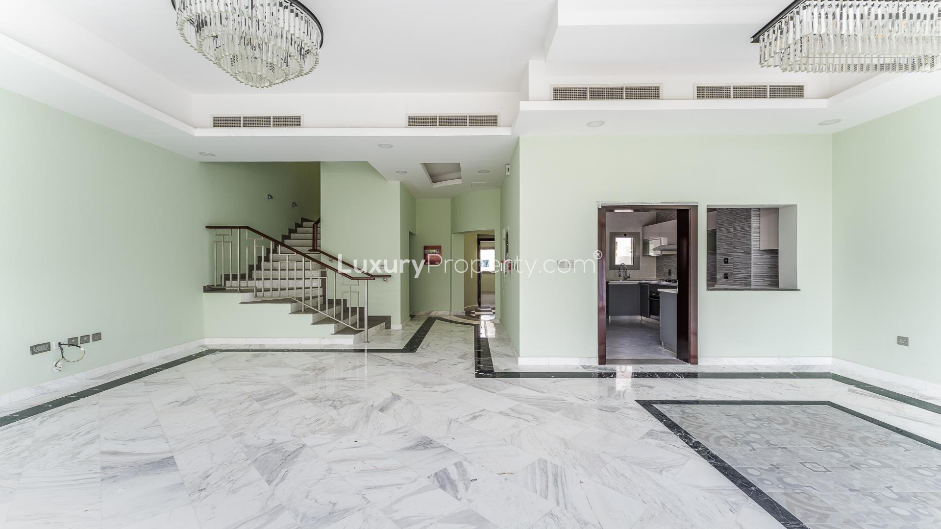 Modern four-bedroom townhouse exterior with garden in The Dreamz, Al Furjan community