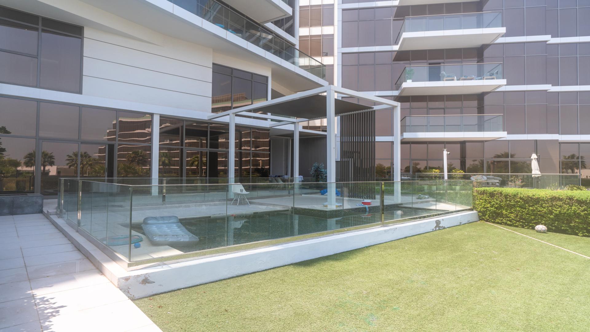 Turn-Key 4-Bedroom Duplex Townhouse patio with pool view, The8, Palm Jumeirah