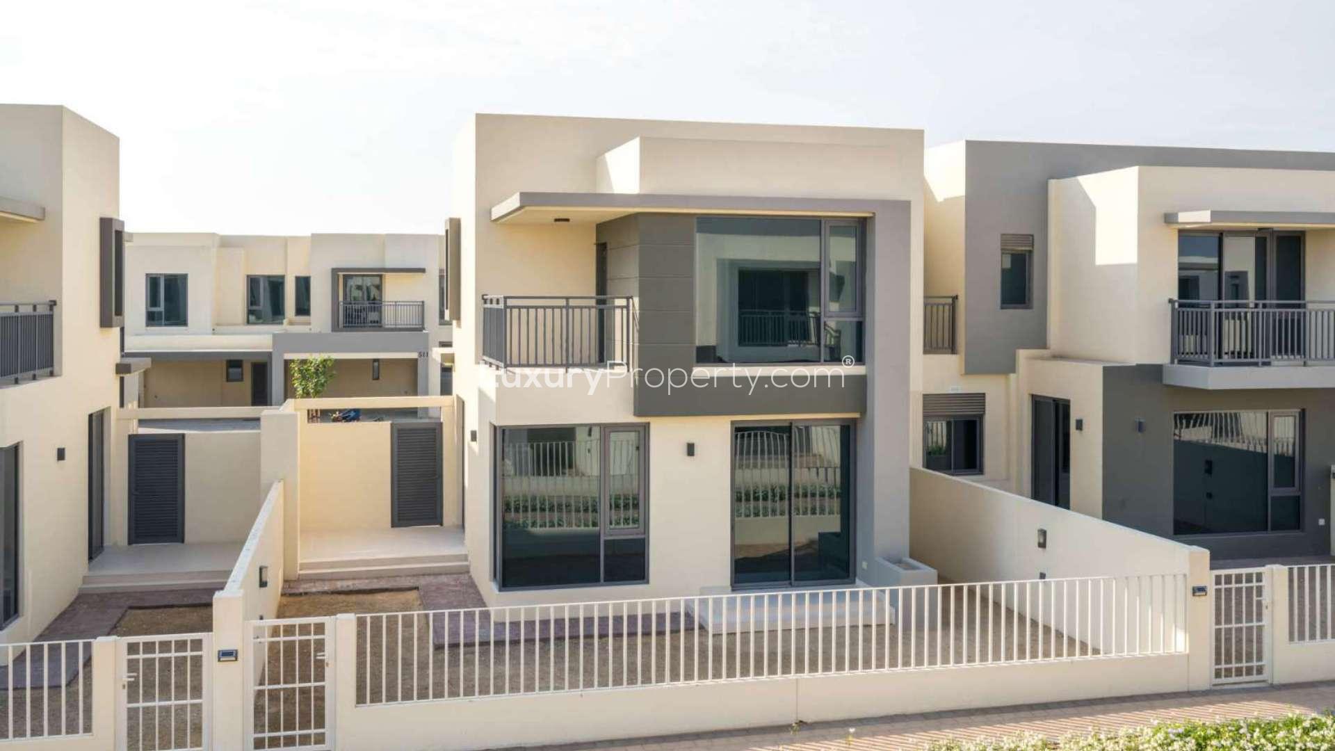 Bright living room with large windows in Maple townhouse, Dubai Hills Estate villa for sale