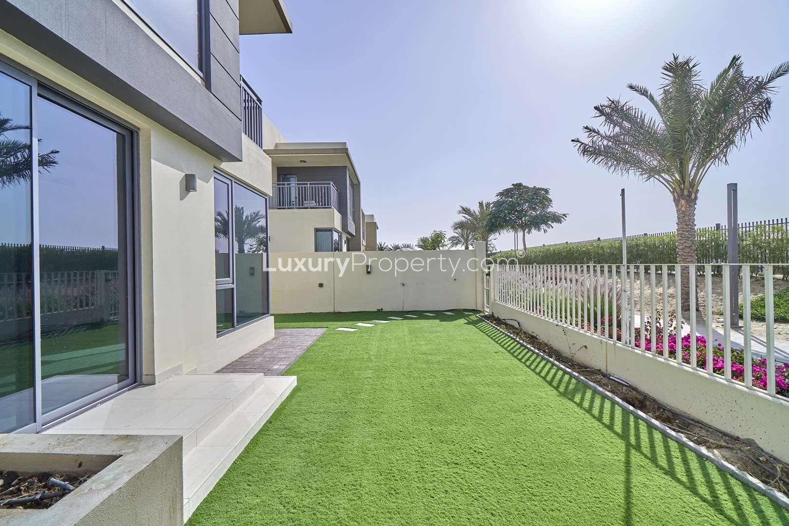 Four-bedroom villa exterior with garden entry in Maple, Dubai Hills Estate for sale