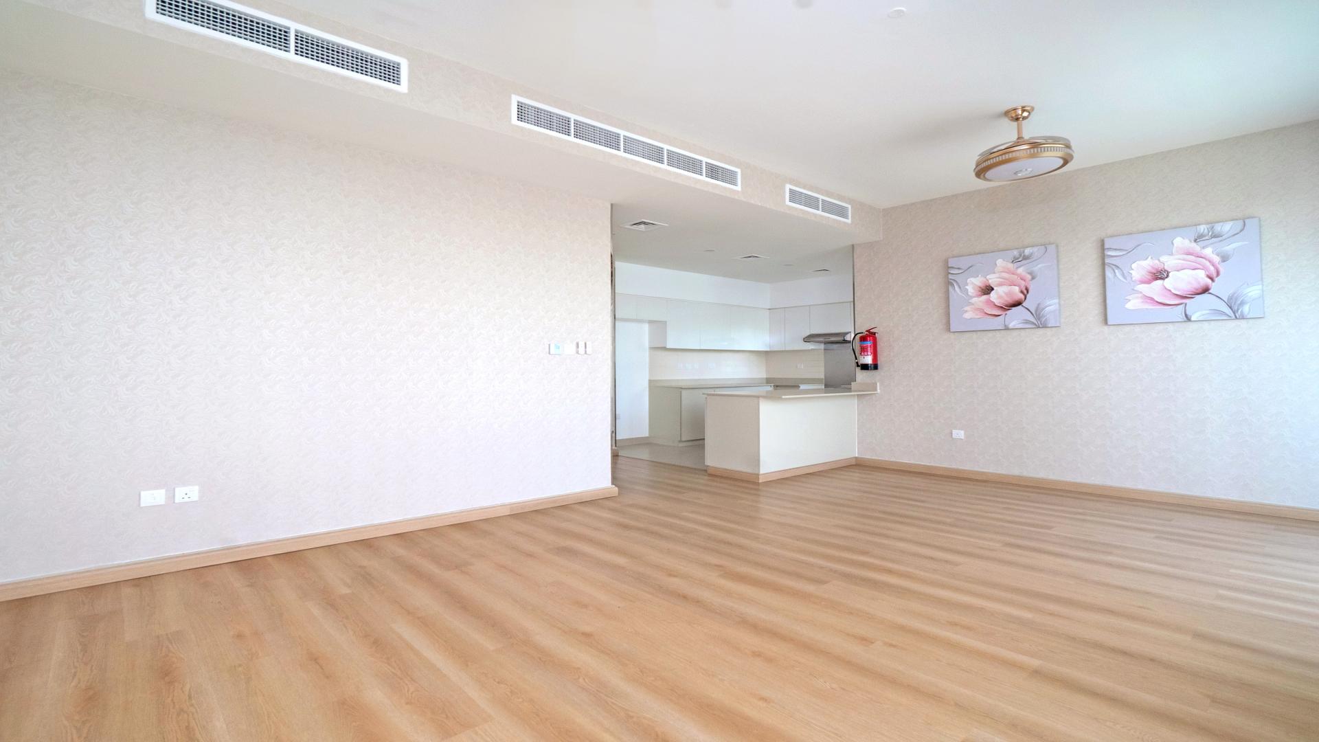 Modern kitchen interior in 4-bedroom townhouse, Maple at Dubai Hills Estate, with spacious design