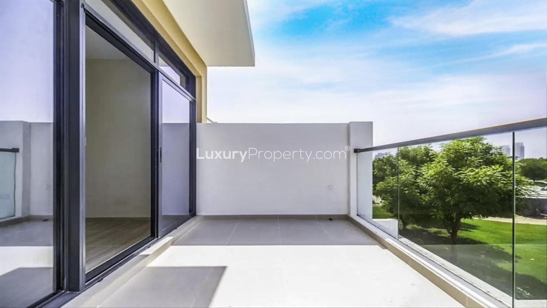 Spacious living area in 4-bedroom DAMAC Hills townhouse, featuring modern open-plan design