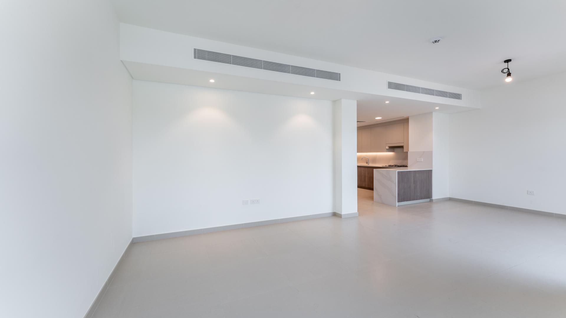 Spacious living area with large windows in Elan villa, Tilal Al Ghaf