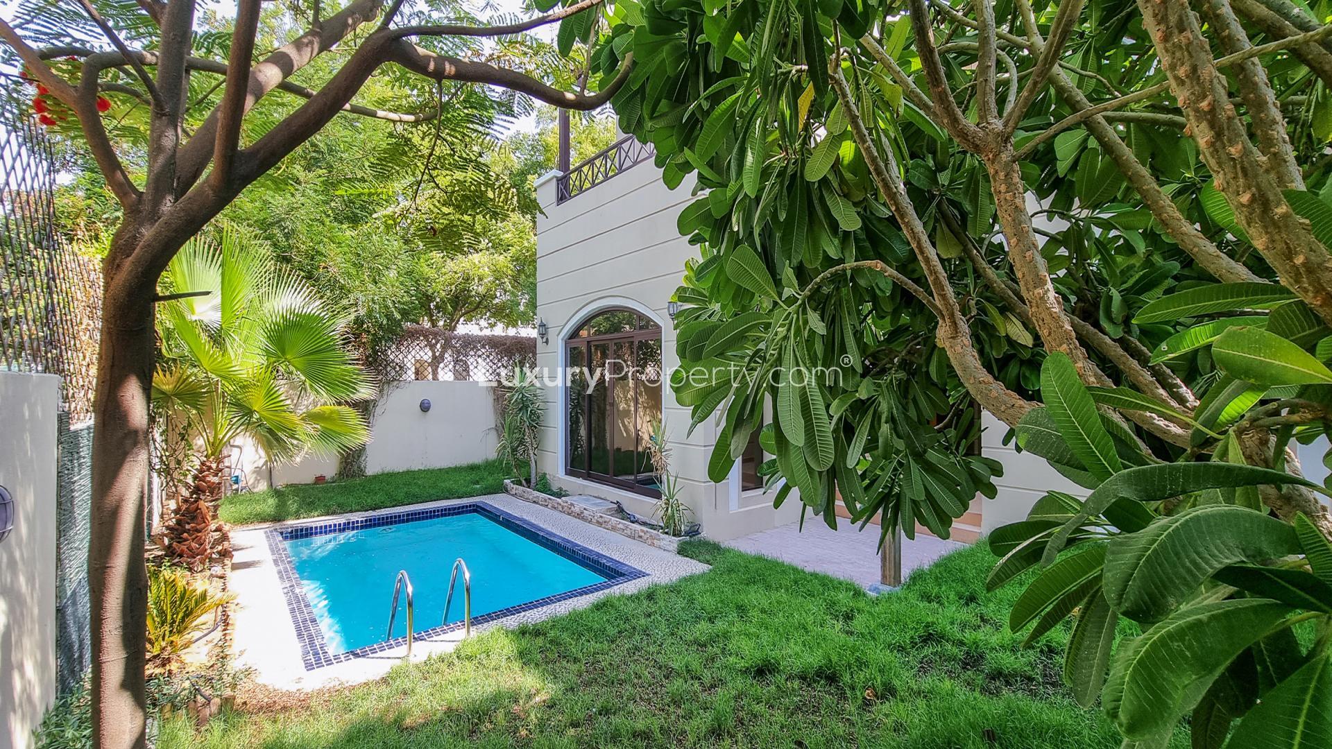 Luxurious Al Salam townhouse interior with large windows and garden view in Mudon, Dubai
