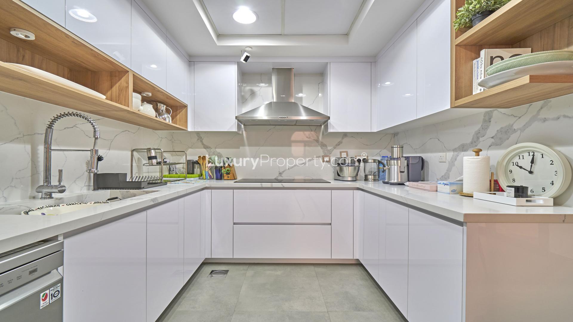 Modern kitchen in 4-bedroom townhouse for sale, Mudon Naseem community