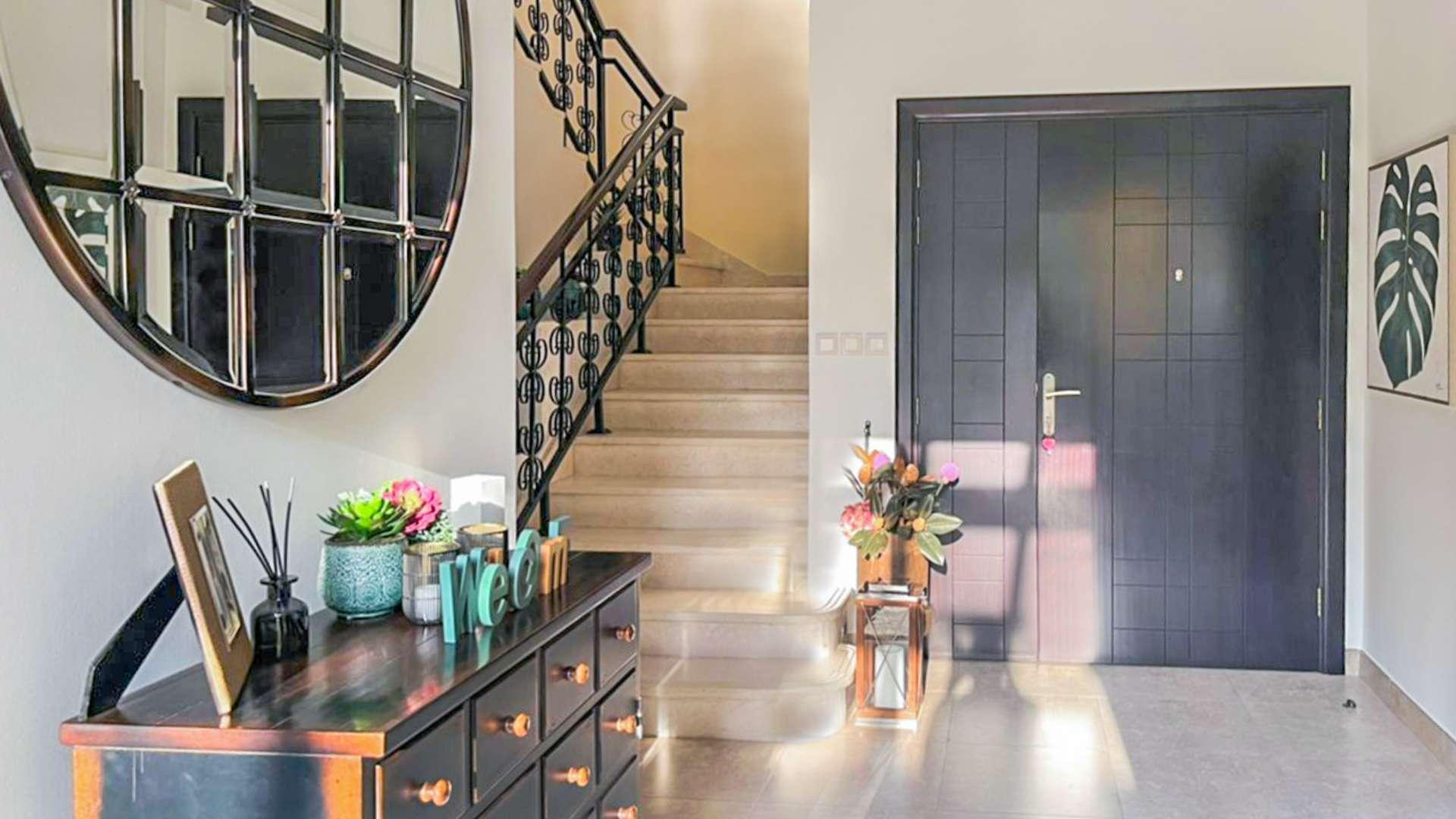 Living room in upgraded Mudon townhouse, featuring elegant furniture and natural light