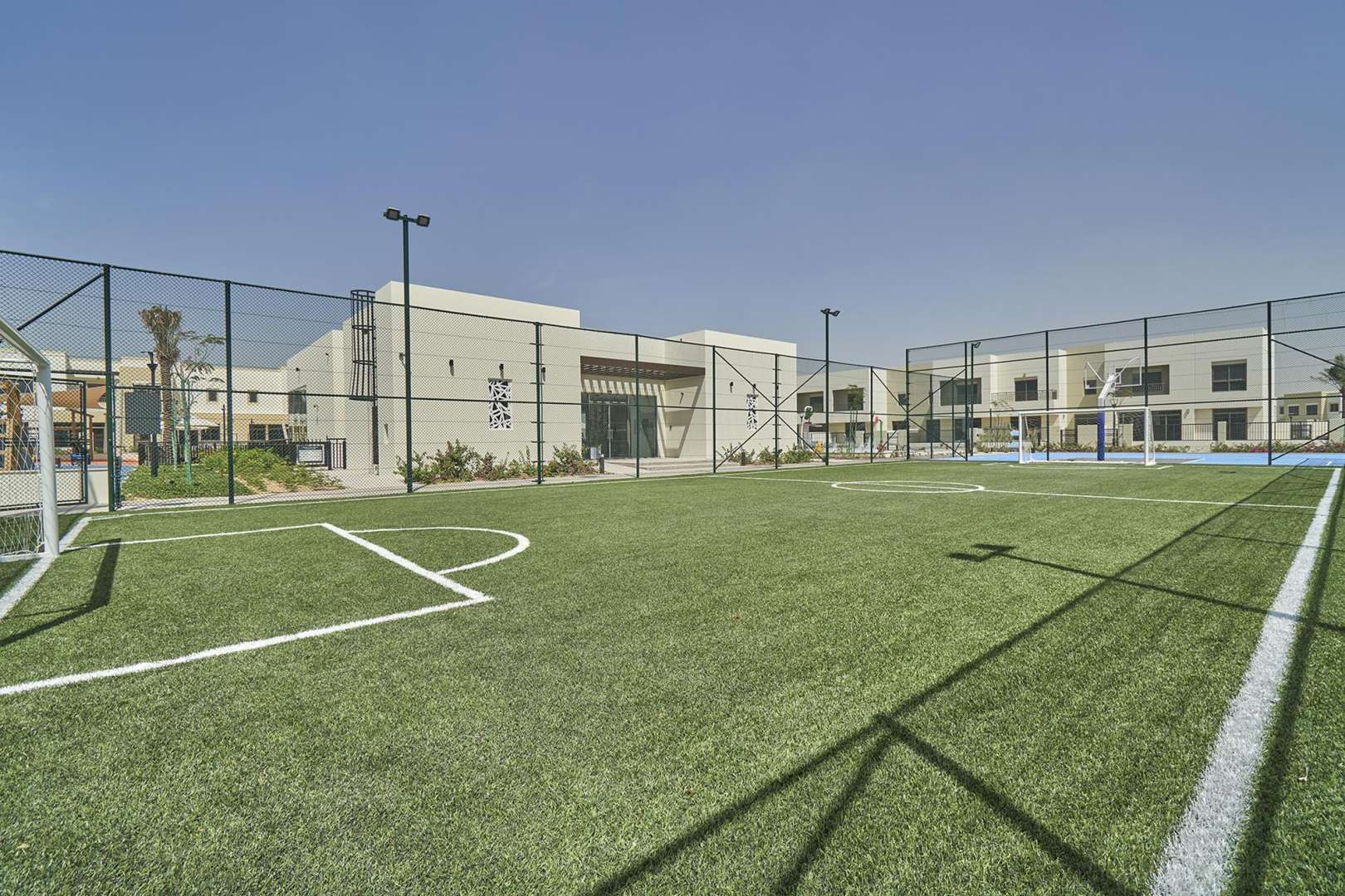 Four-bedroom townhouse exterior in Naseem, Town Square, available for sale