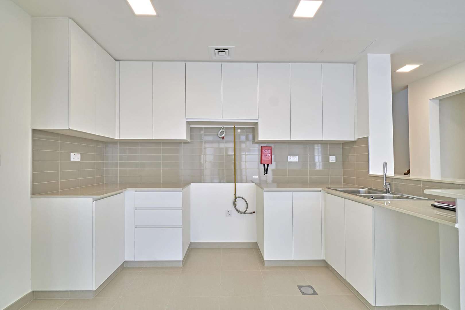 Brand-new 4-bedroom townhouse exterior in Naseem, Town Square, for sale