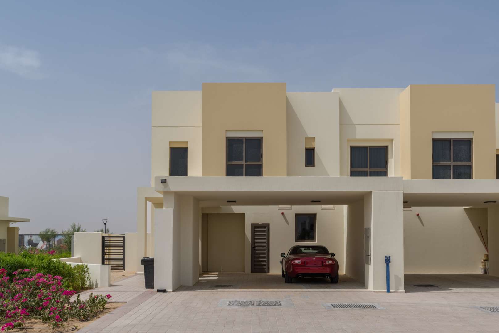 Bright hallway and staircase in four-bedroom Naseem Townhouse, Town Square Dubai