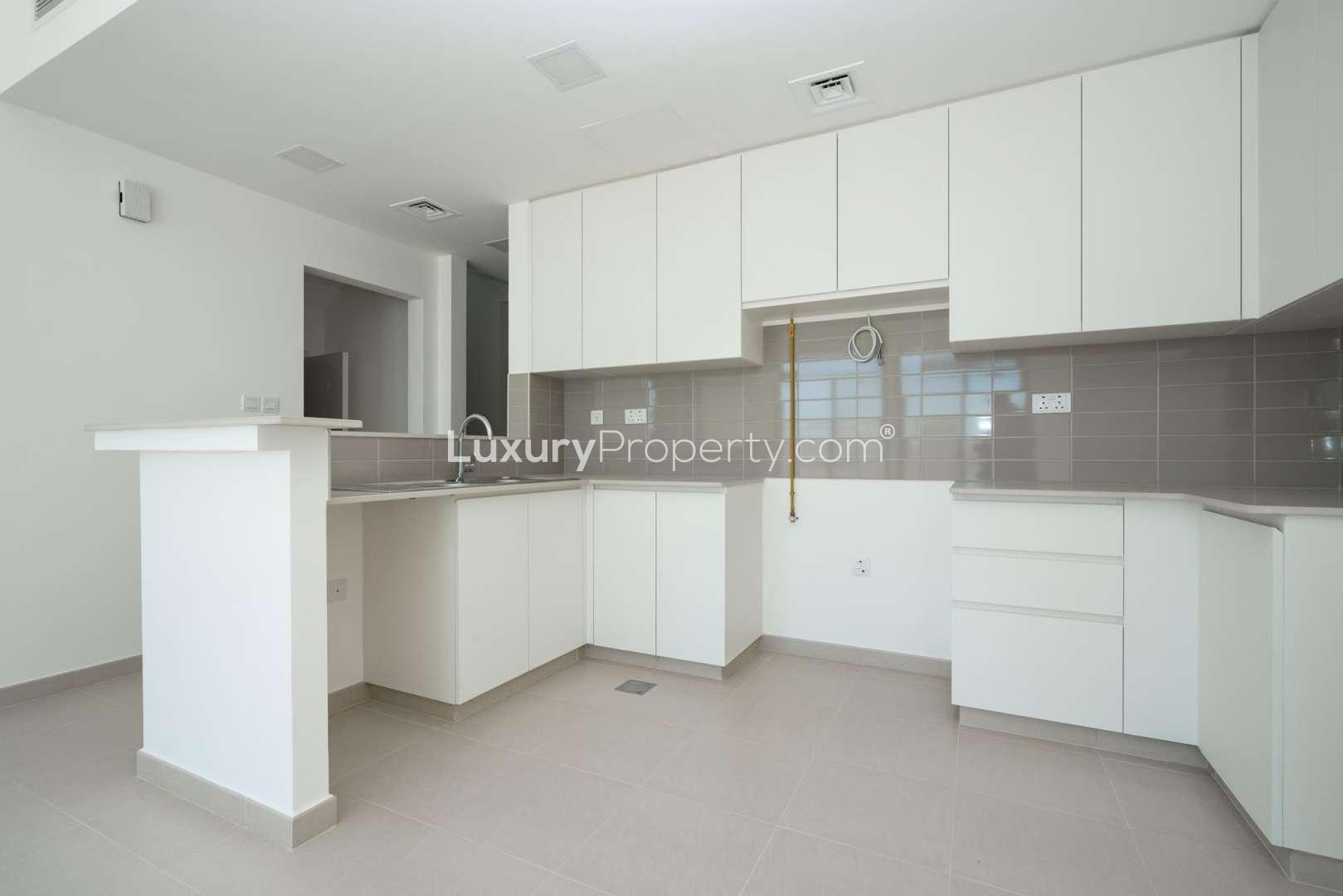 Charming Type 4 single-row townhouse in Noor, Town Square, with adjacent pathway view