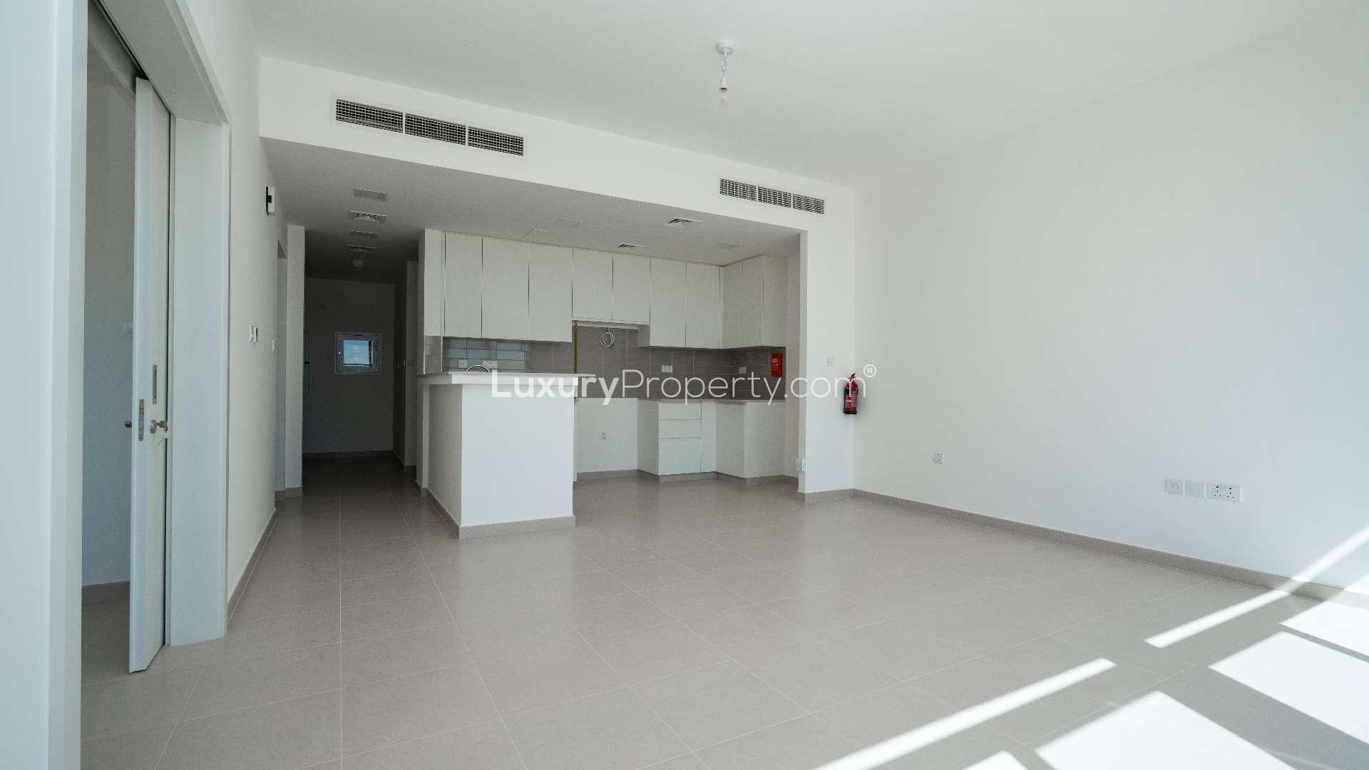 Bright kitchen and living area in 4-bedroom Noor Townhouse, Town Square, for sale