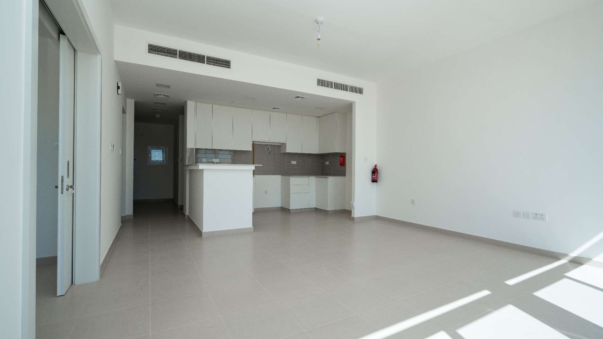 Bright kitchen and living area in 4-bedroom Noor Townhouse, Town Square, for sale