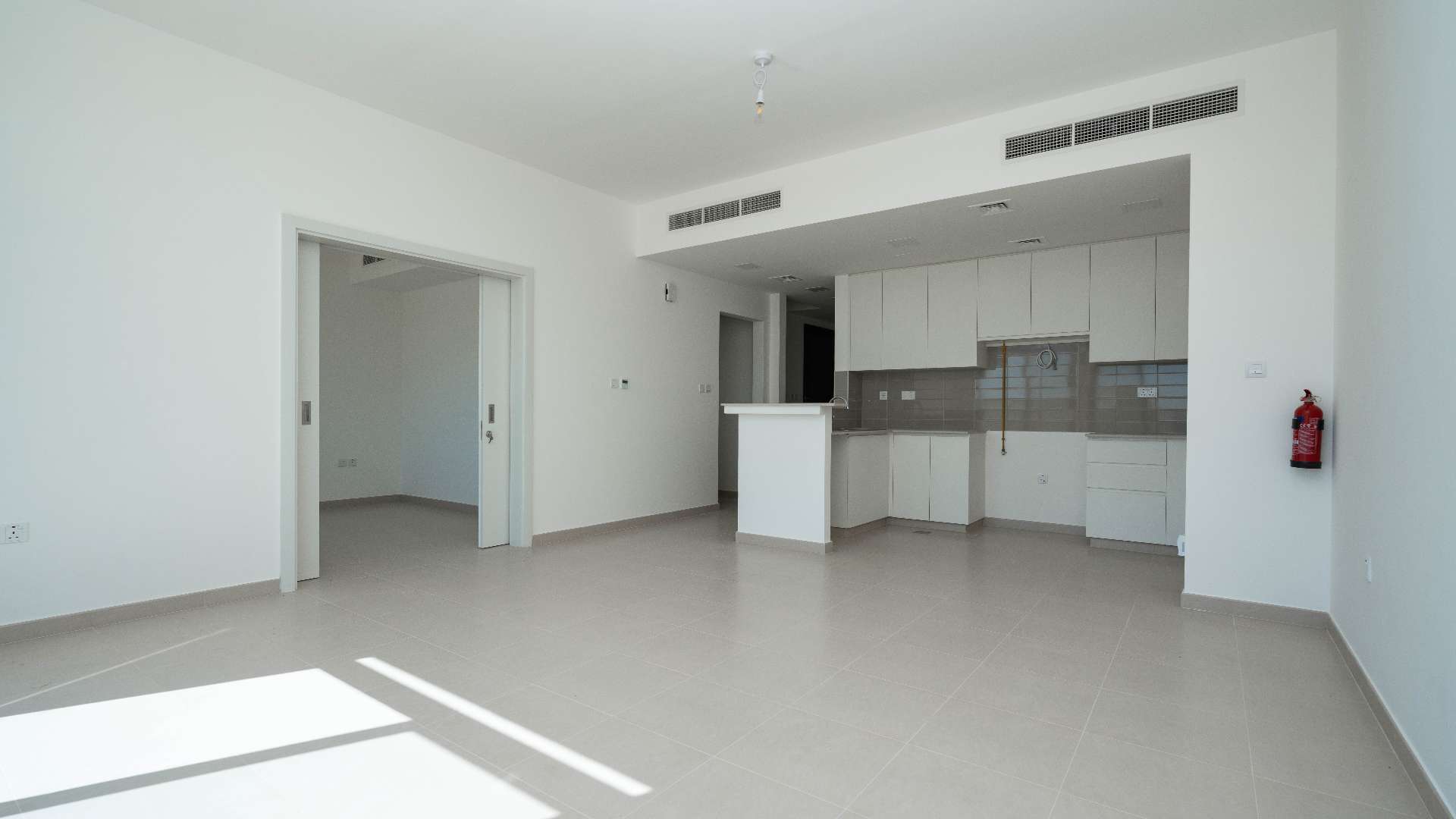 Modern kitchen in 4-bedroom townhouse, Noor Townhouses, Town Square, available September