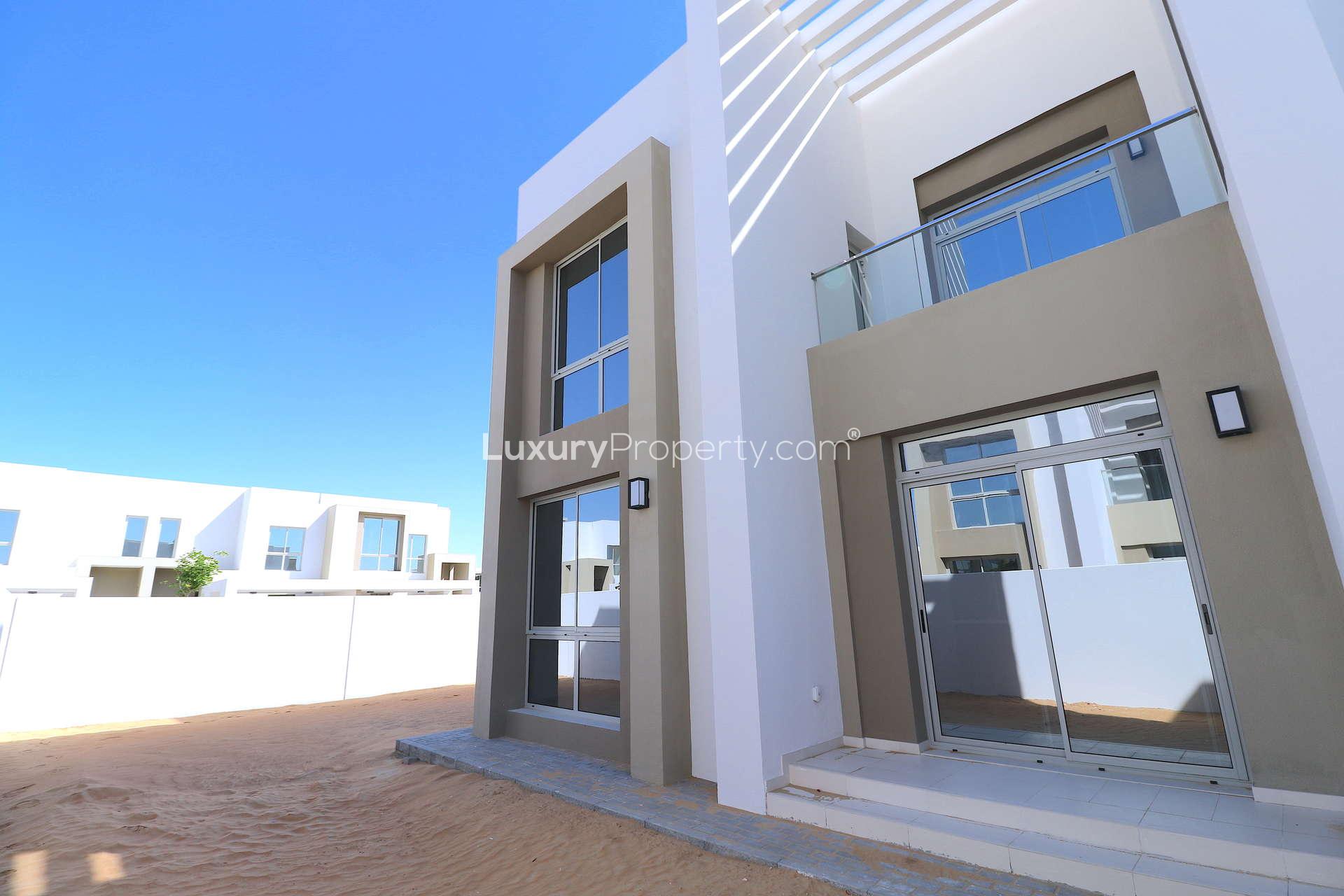 Modern 4-bedroom townhouse exterior in Reem, Arabian Ranches 2, Dubai, for rent