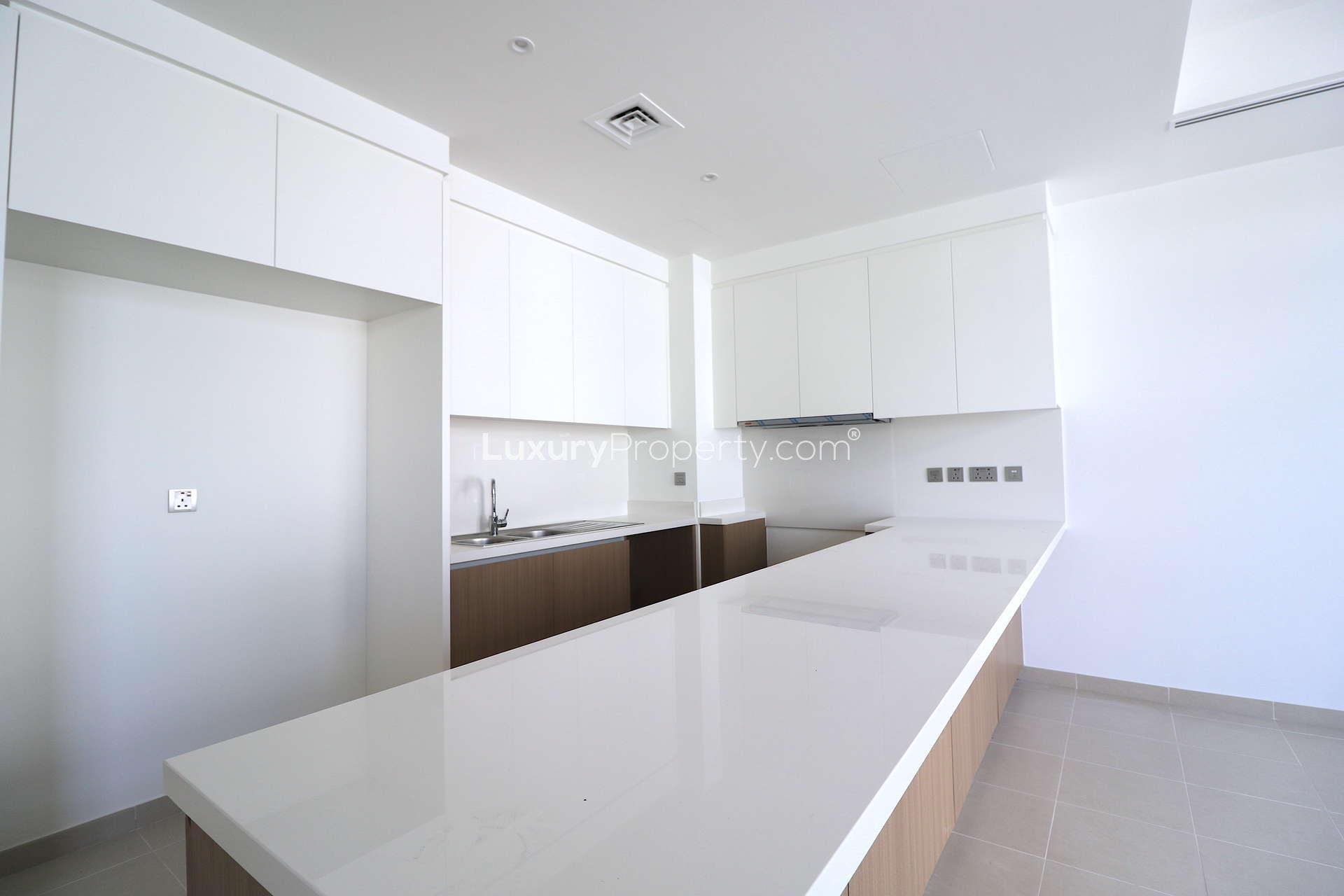 Modern kitchen in 4-bedroom townhouse, Reem Community, Arabian Ranches 2, available for rent