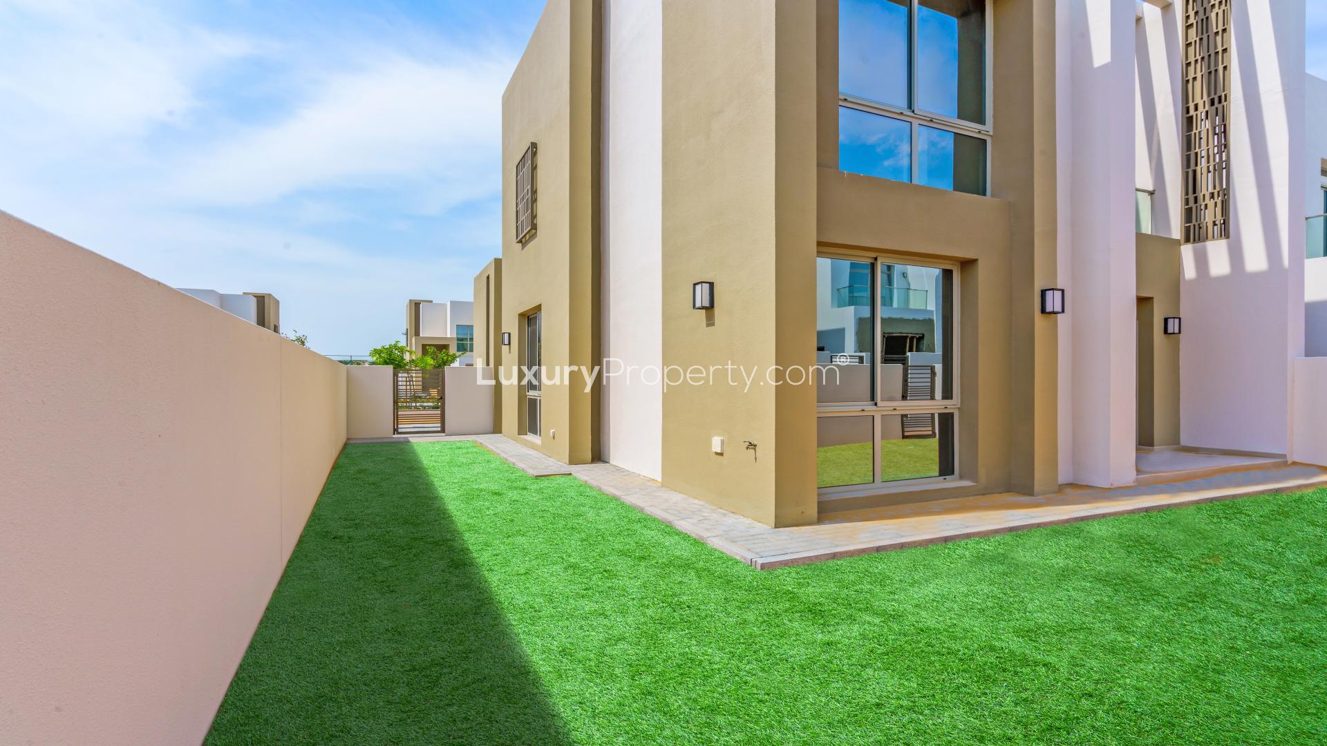 Modern kitchen with sleek countertops in 4-bed townhouse, Reem Community, Arabian Ranches 2