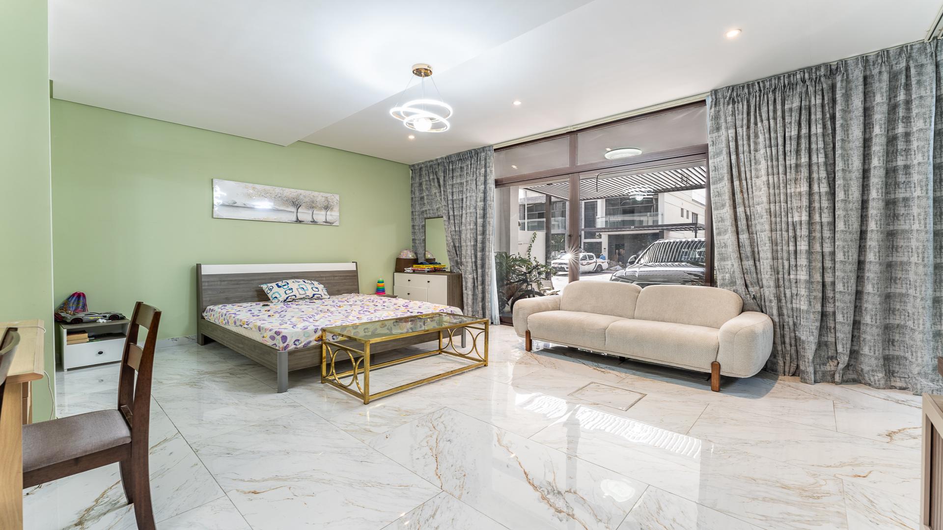 Upgraded 4-bedroom villa exterior in Trevi, Damac Hills, for sale