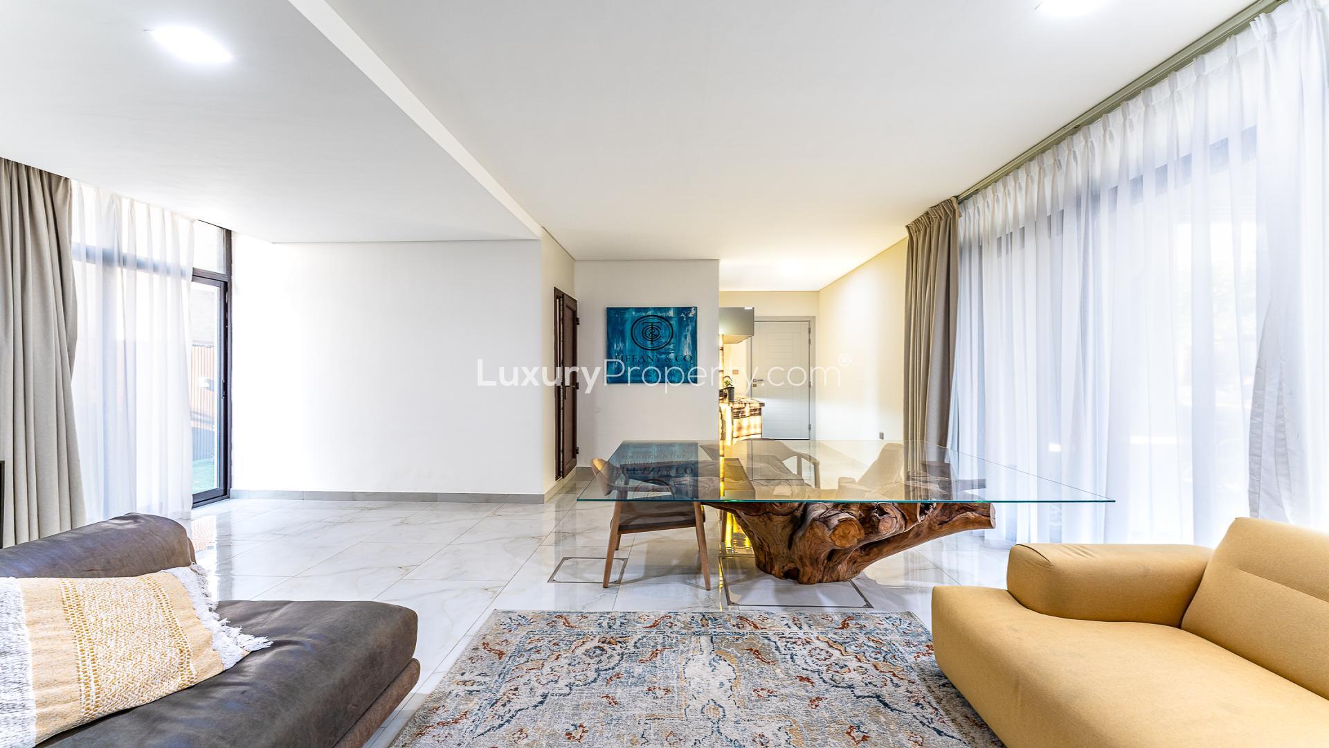 Modern living room in 4-bedroom townhouse, Veneto Villas, Damac Hills, with elegant decor