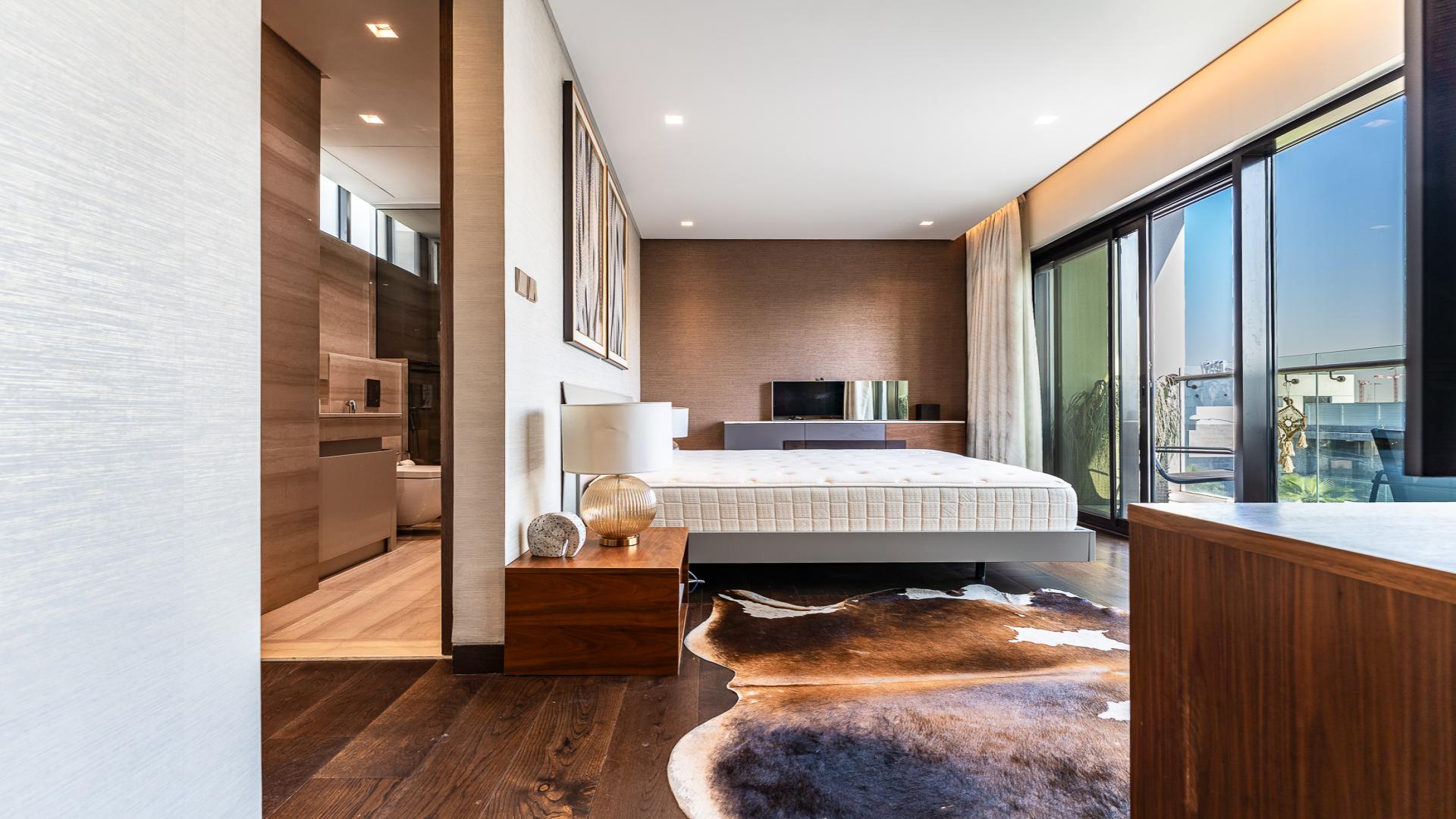 N/A,Balcony view of Veneto Villas, Damac Hills, featuring modern outdoor seating and decor