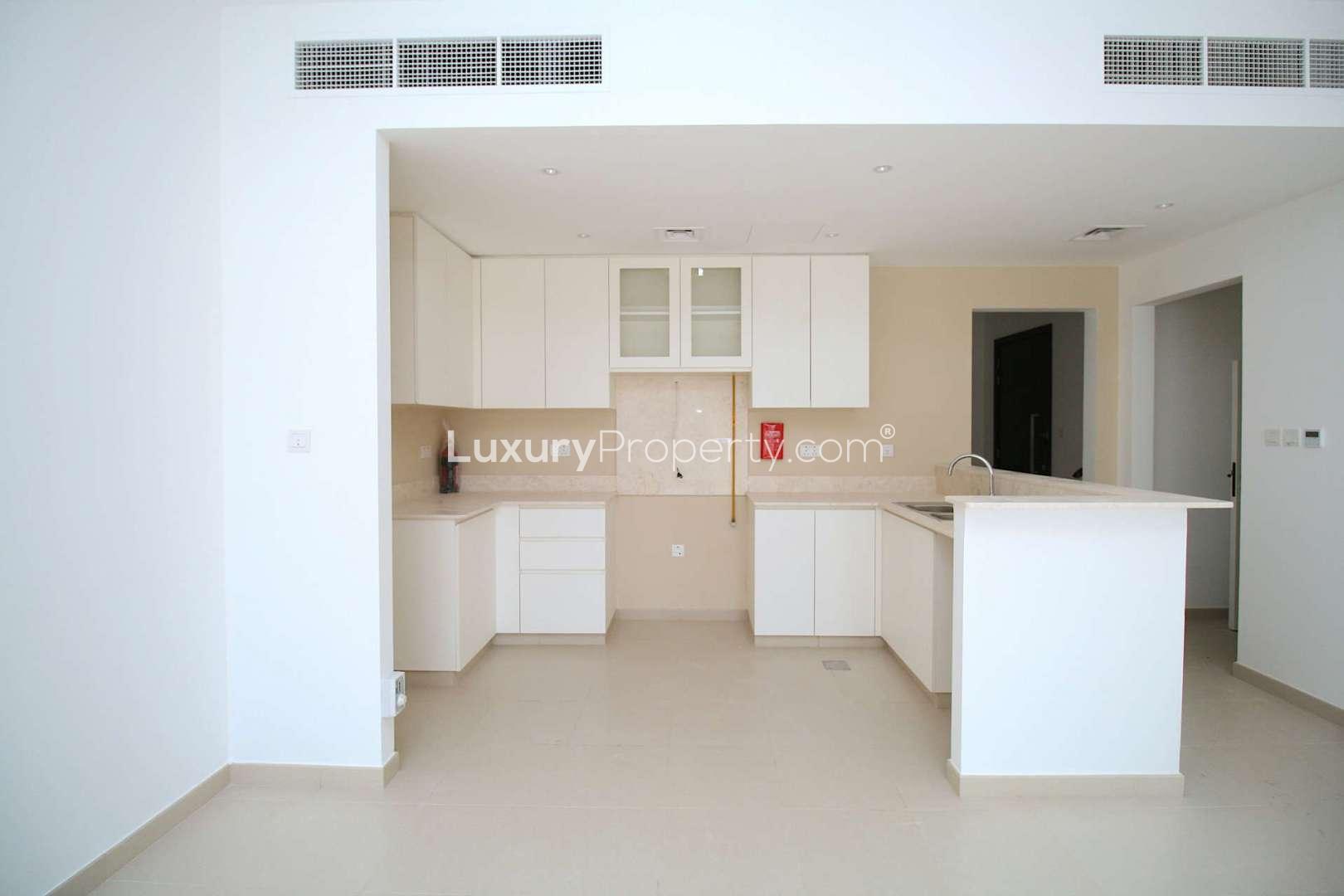 Stylish 4-bedroom townhouse exterior in Safi, Town Square, for sale