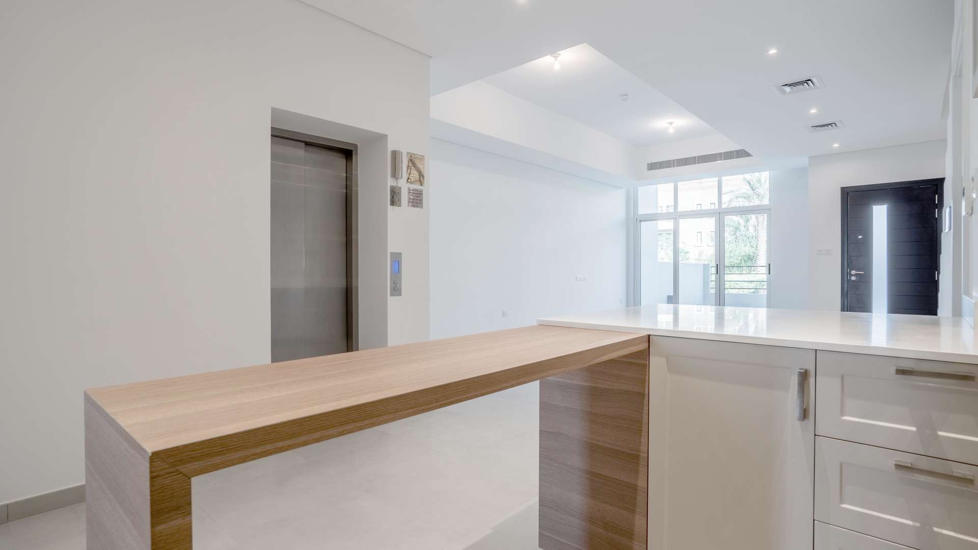 Luxurious open-plan kitchen and living area in Somerset Mews townhouse, JVC for sale