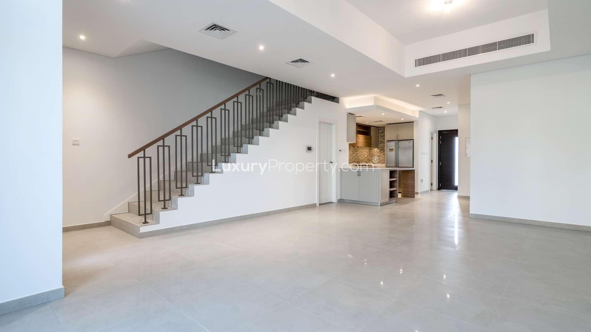 Modern kitchen in luxurious four-bedroom townhouse, Somerset Mews, Jumeirah Village Circle, for sale