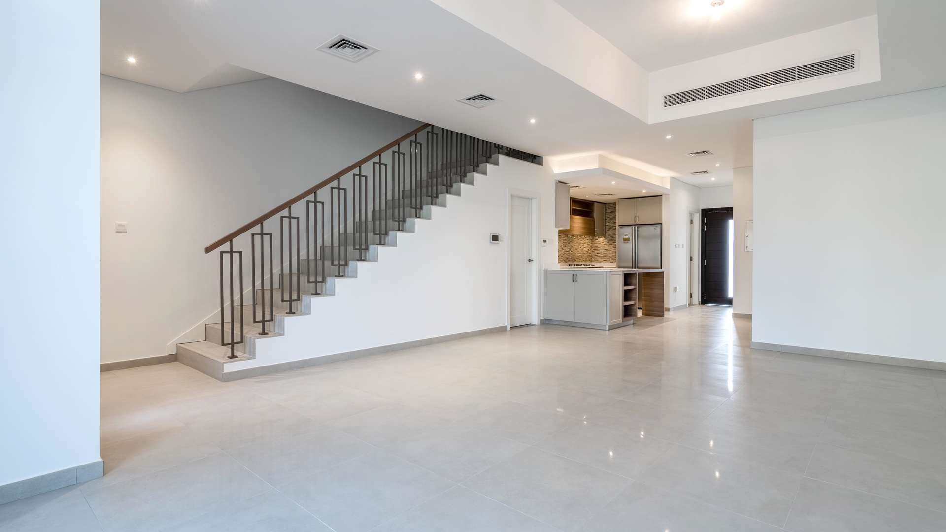 Modern kitchen in luxurious four-bedroom townhouse, Somerset Mews, Jumeirah Village Circle, for sale