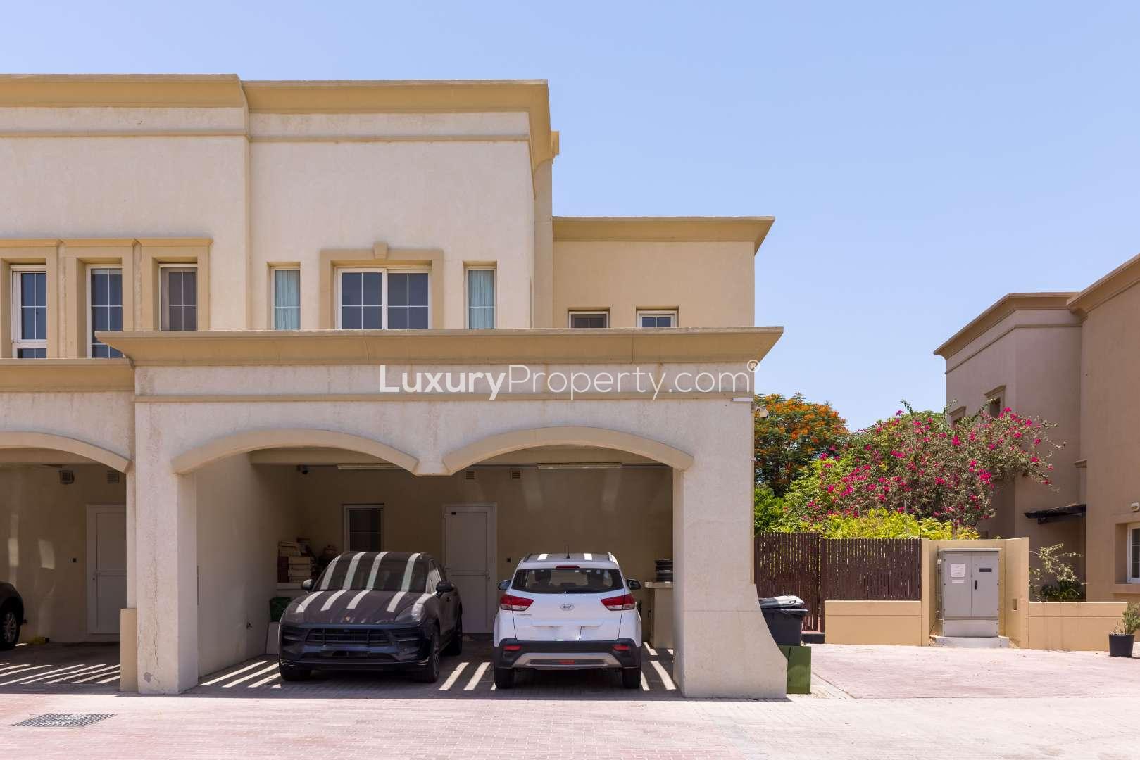 Townhouse exterior with garage in Springs 3, The Springs community, for sale