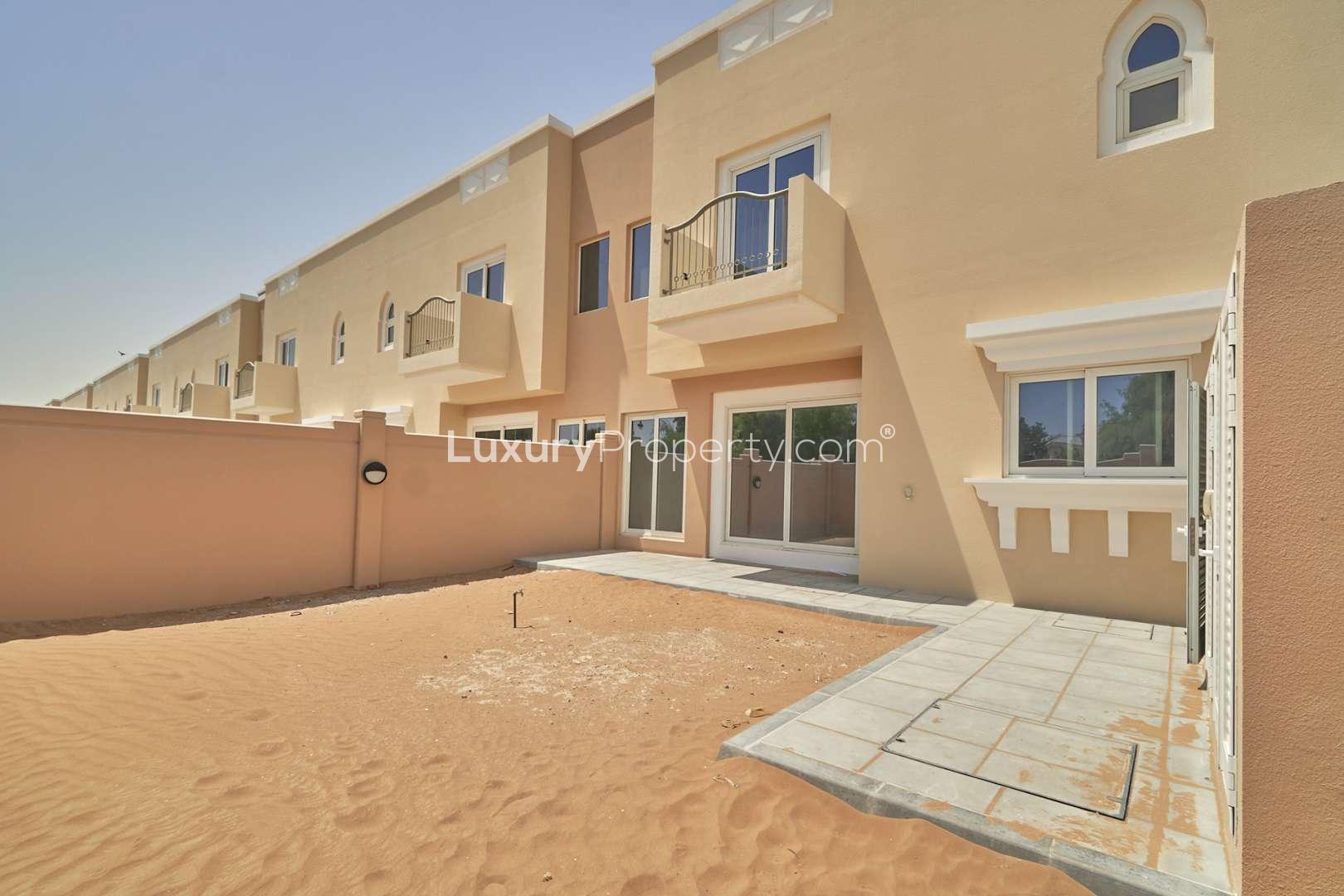Contemporary 4-bedroom townhouse exterior in Marbella, Victory Heights, Dubai Sports City for sale