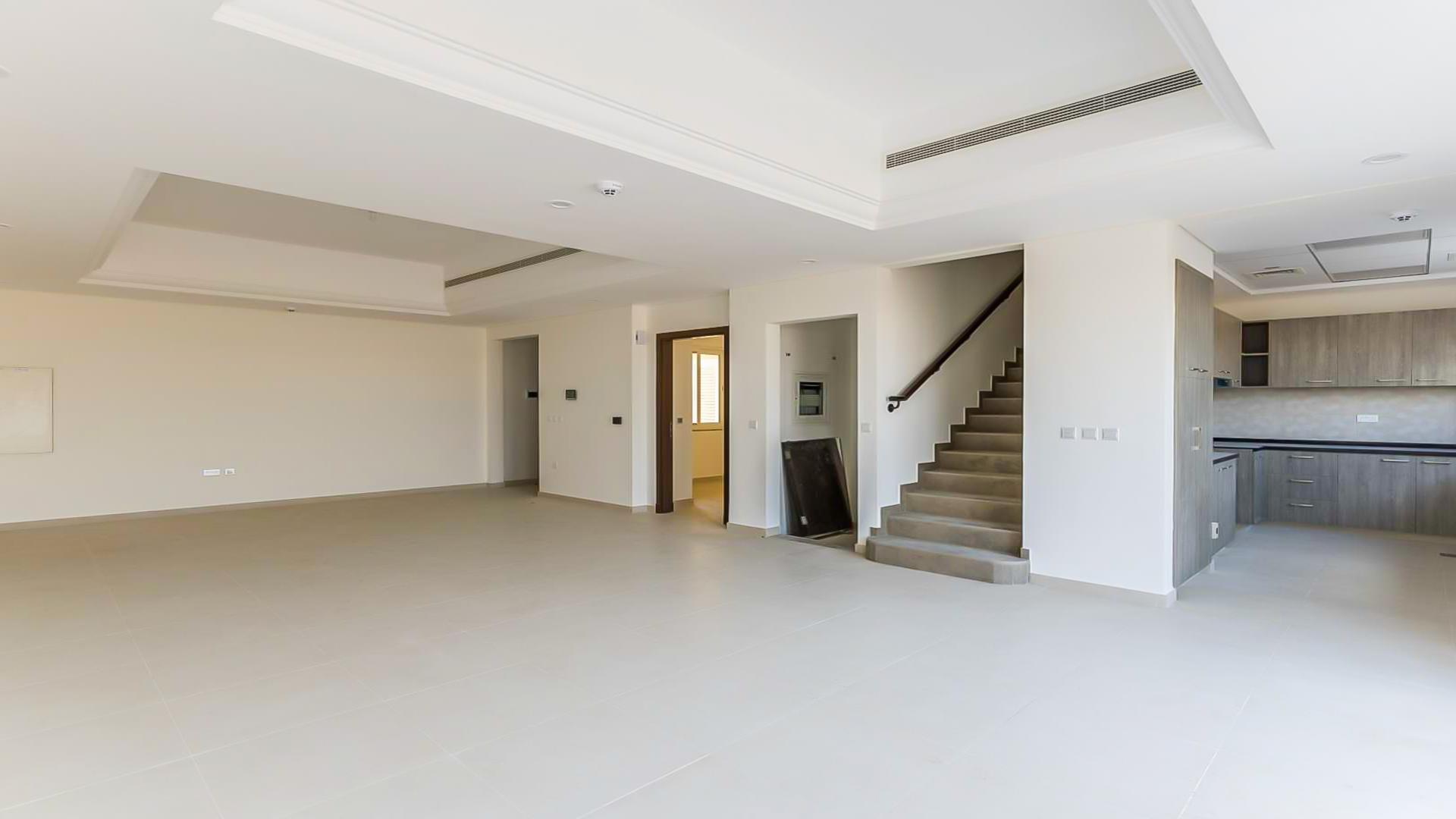 Four-bedroom townhouse exterior in Victory Heights, Dubai Sports City, for sale