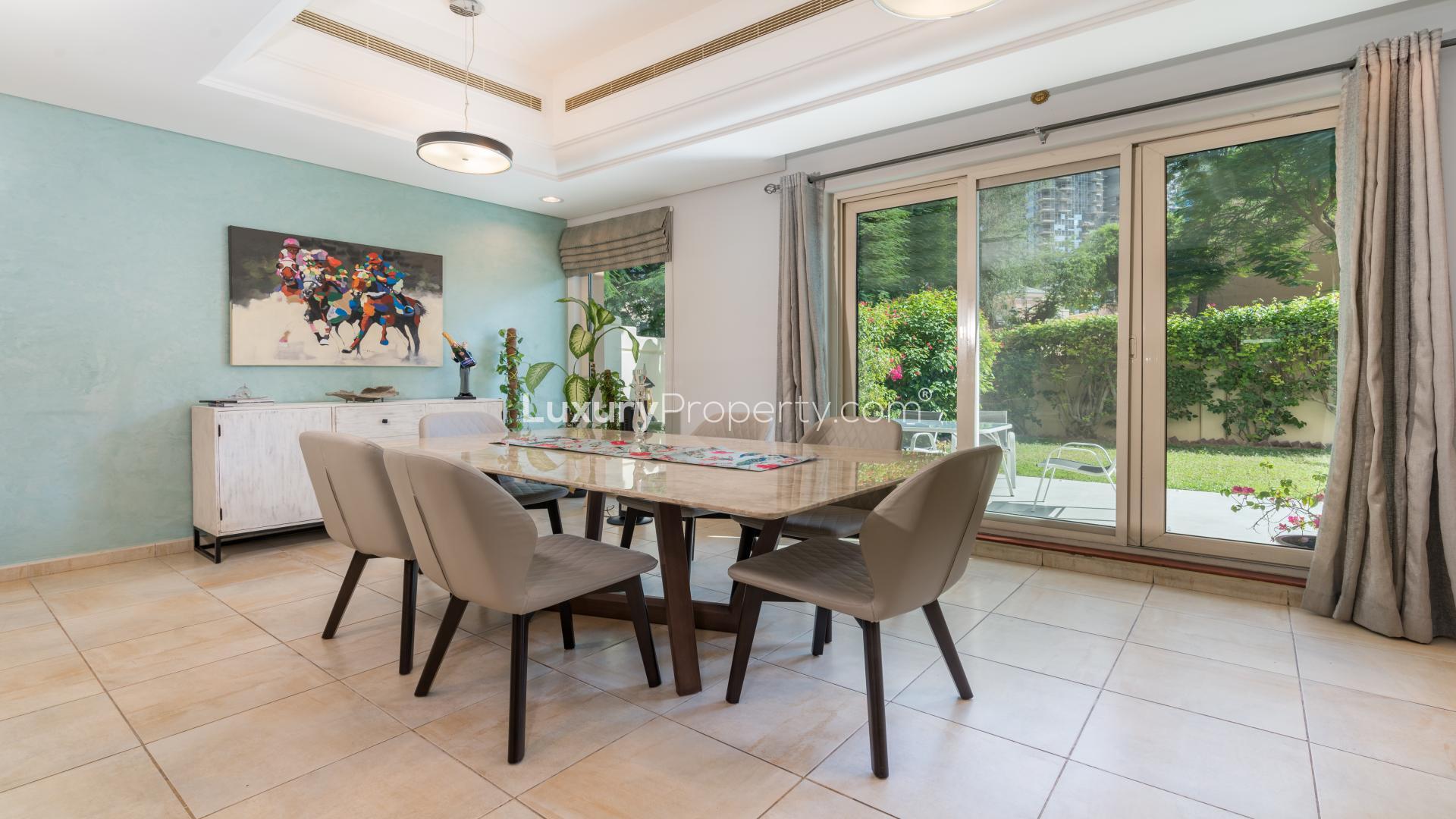 Modern living and dining area in upgraded townhouse, Victory Heights, Dubai Sports City