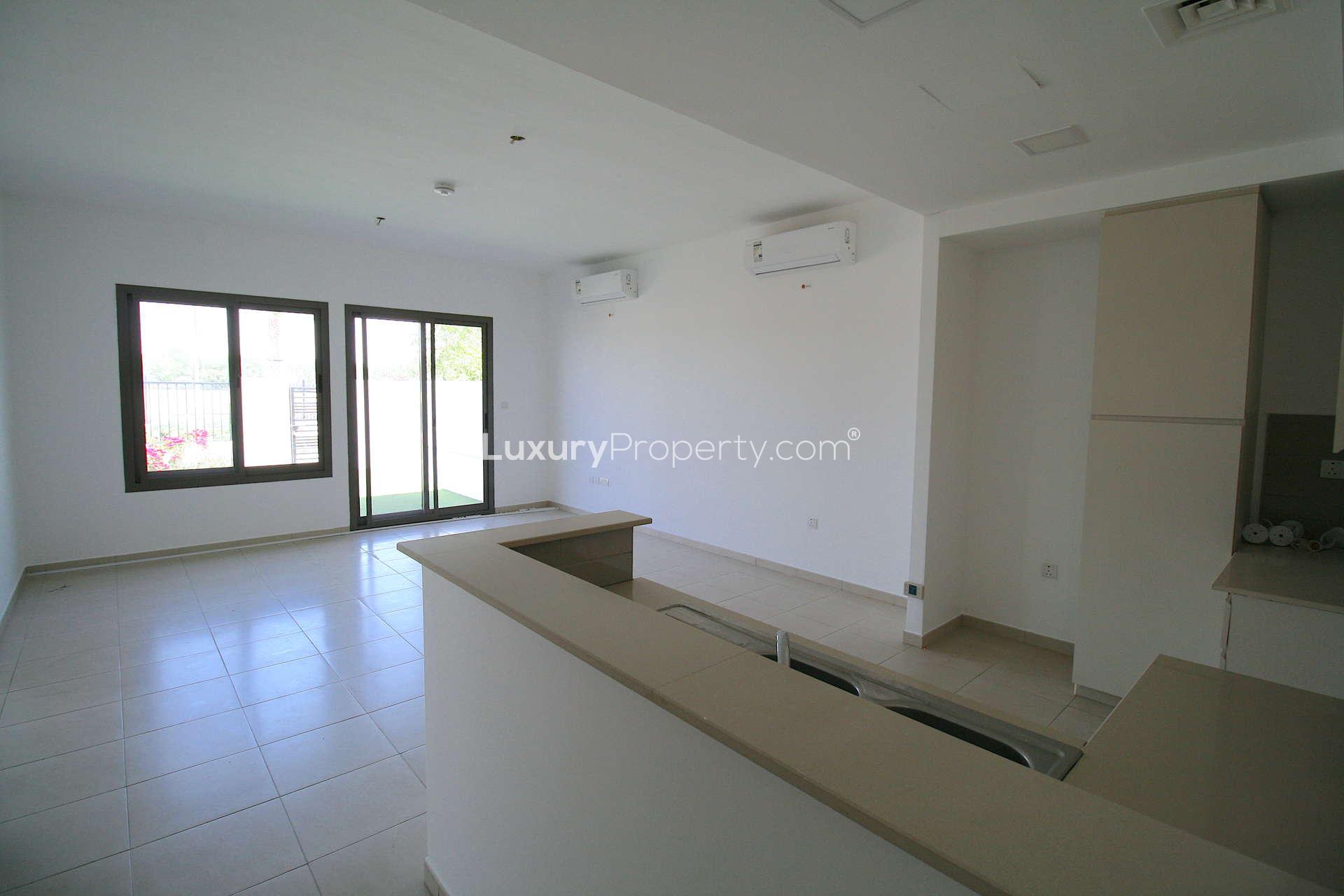 Modern kitchen in elegant 4-bedroom townhouse for sale, Zahra Town Square, Dubai