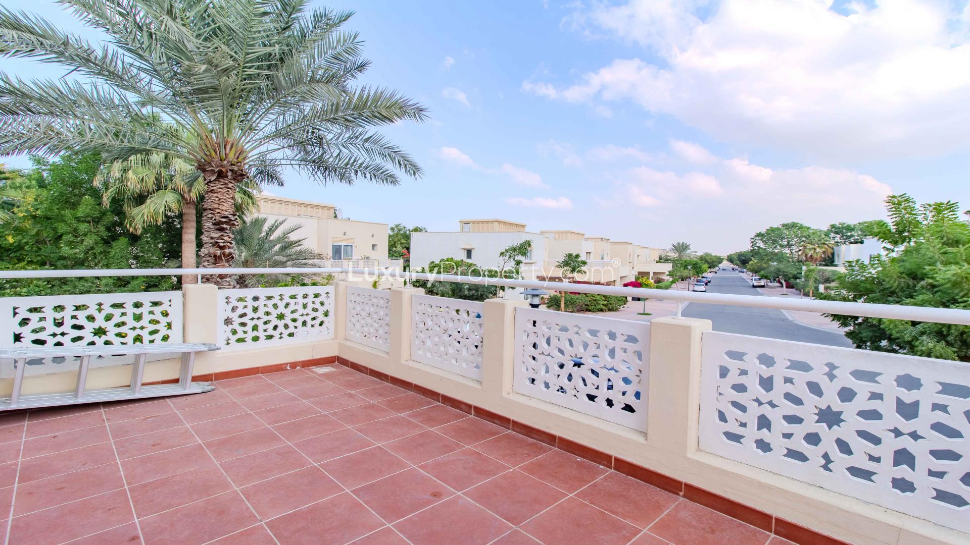 Bright entrance of 4-bed villa in Meadows 9, featuring large windows and tiled flooring