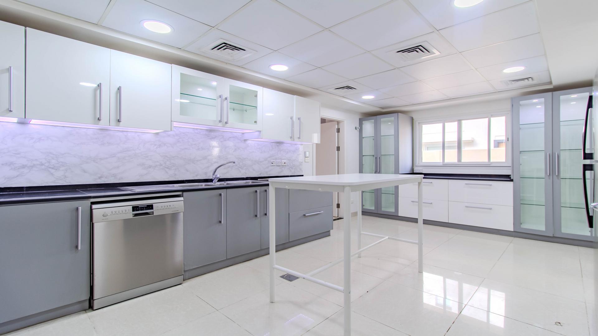 Spacious villa terrace with garden view in Meadows 9, ideal for family living