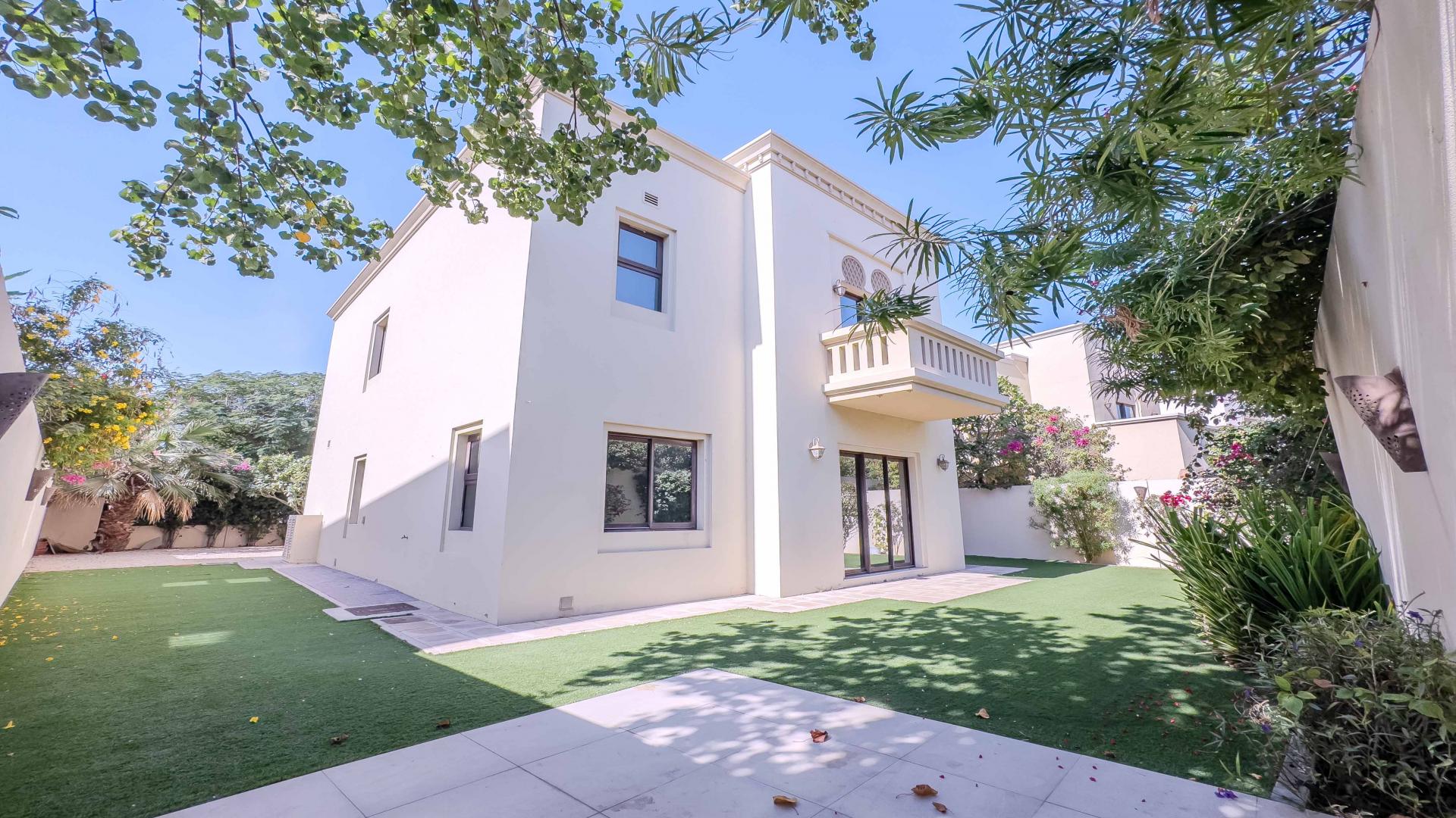 Luxurious villa interior with staircase and garden view in Arabian Ranches 2, Casa community