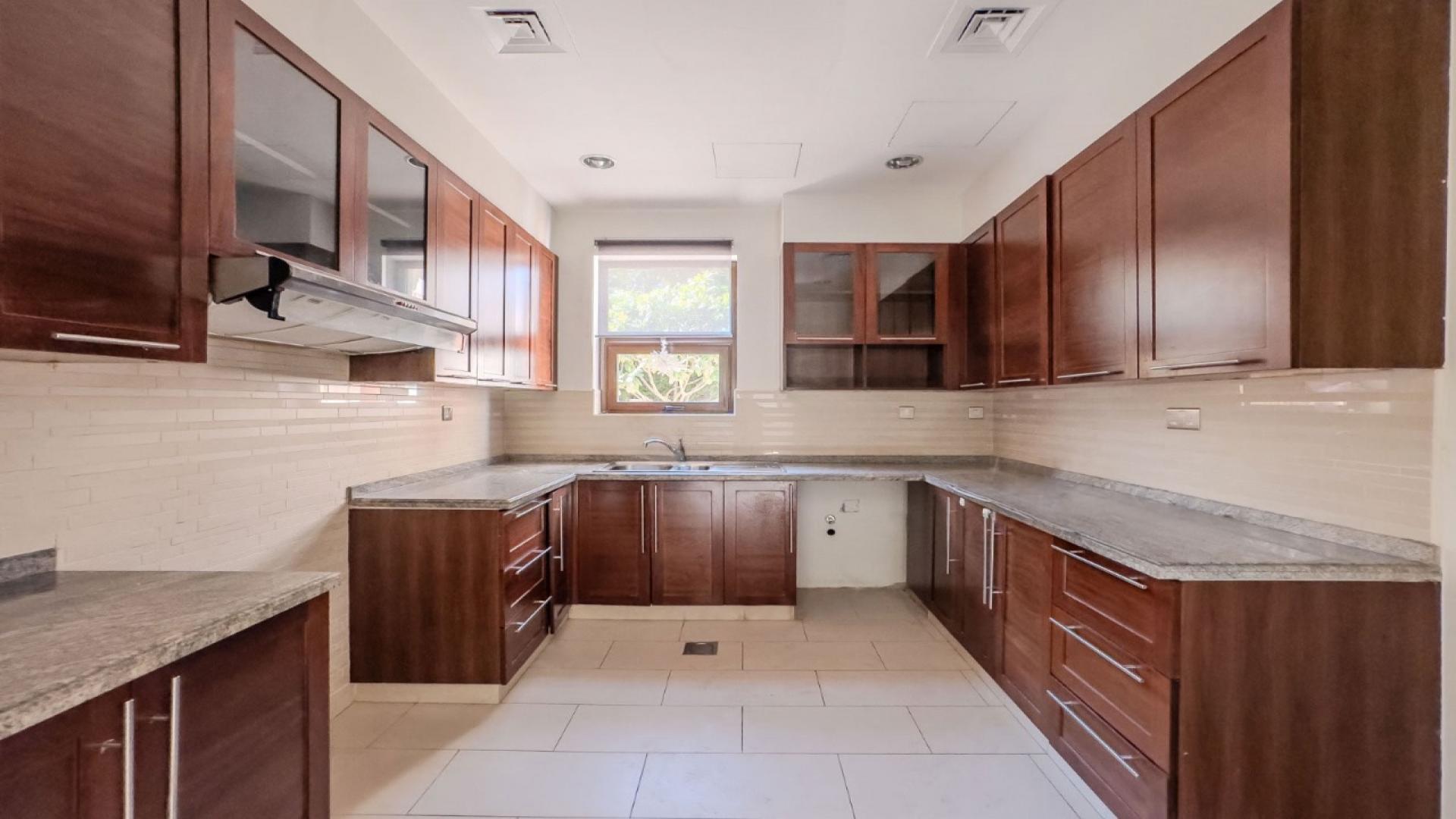 Luxurious 4-bedroom villa exterior with garden in Arabian Ranches 2, Casa community