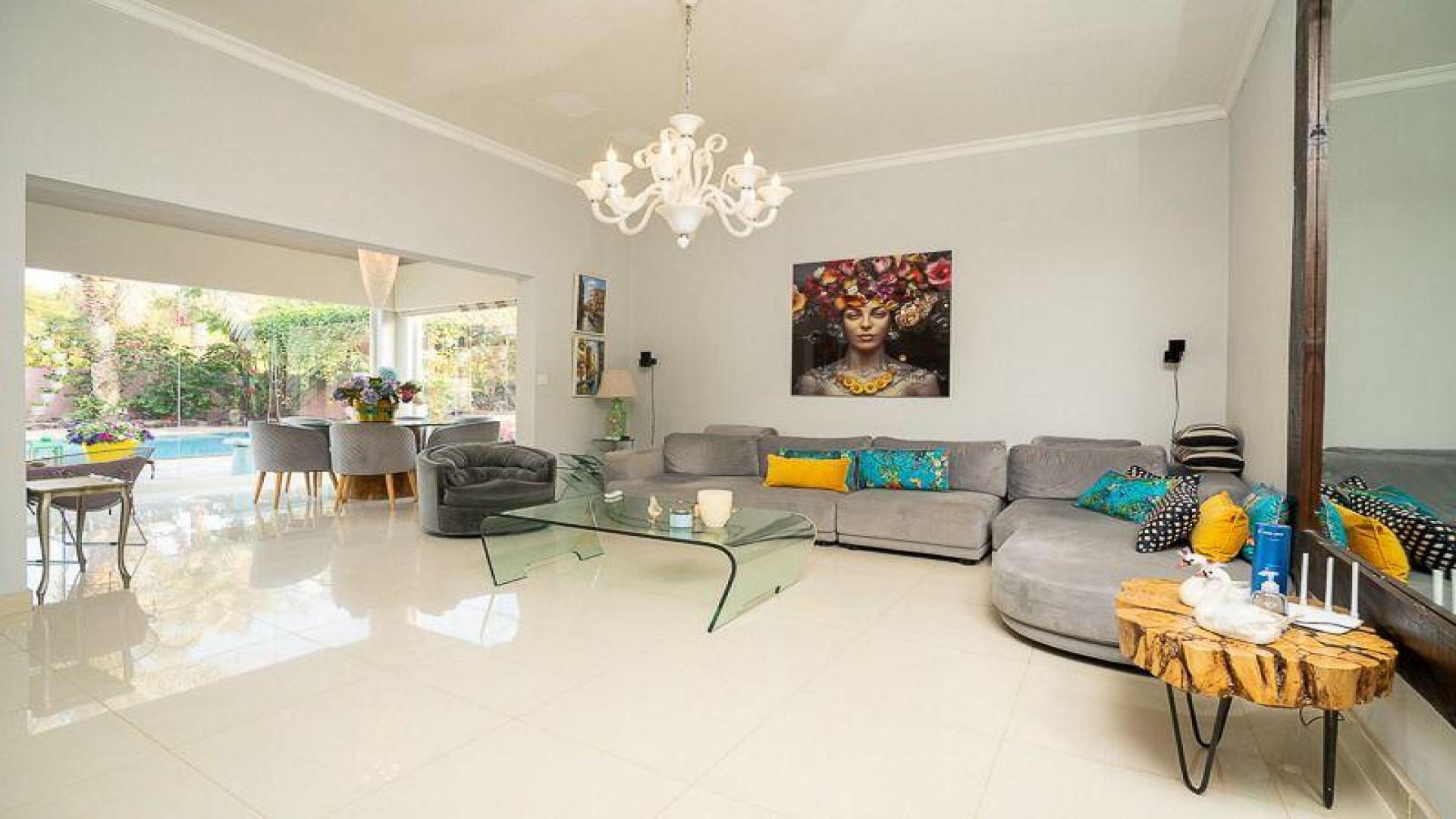 Luxurious villa pool with award-winning landscaped garden in Meadows 9, available for rent