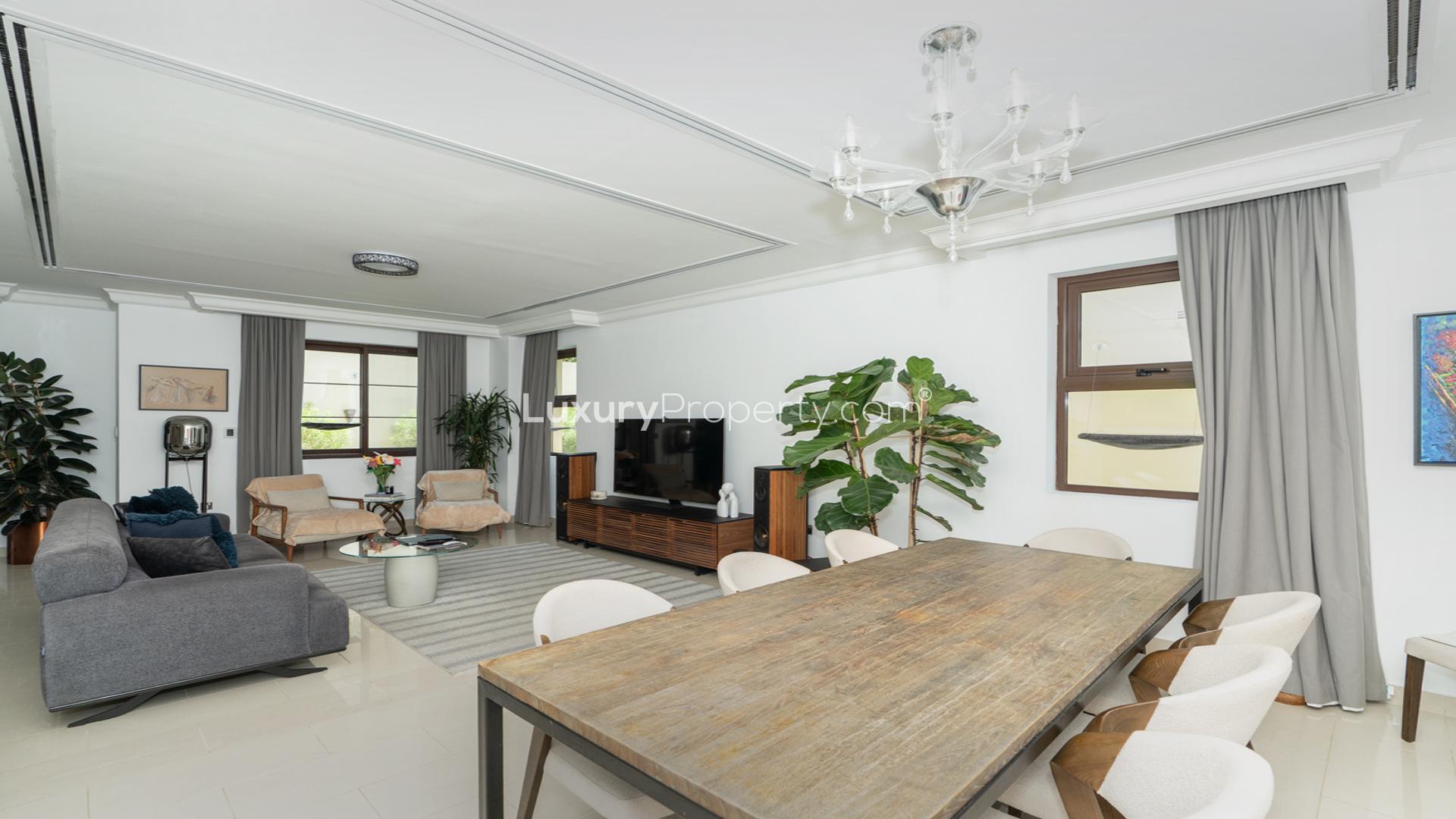 "Spacious backyard with patio seating in Arabian Ranches 2 villa for rent, Casa sub-community.",Contemporary living room in 4-bedroom villa, Casa, Arabian Ranches 2, available for rent