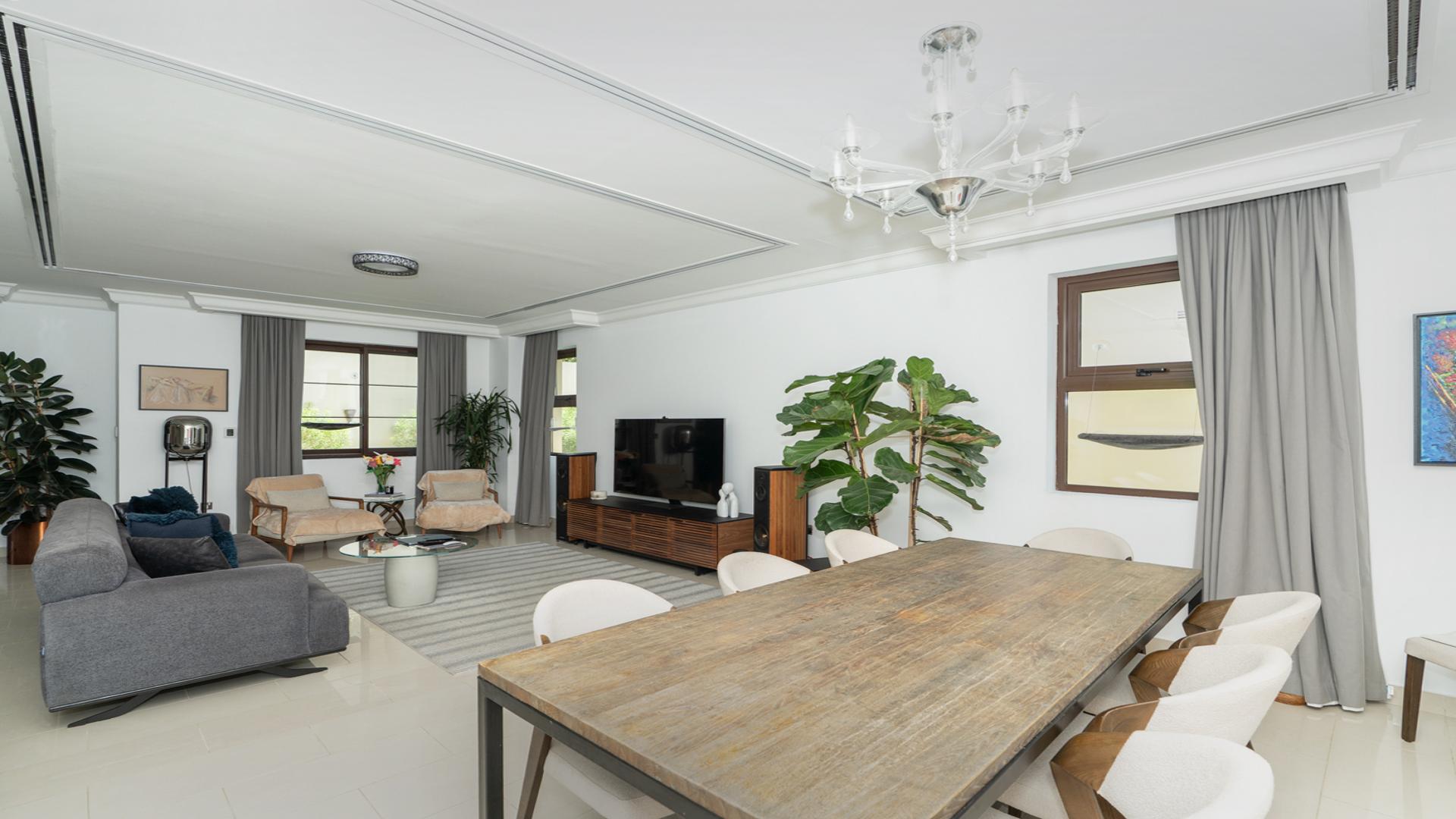 "Spacious backyard with patio seating in Arabian Ranches 2 villa for rent, Casa sub-community.",Contemporary living room in 4-bedroom villa, Casa, Arabian Ranches 2, available for rent