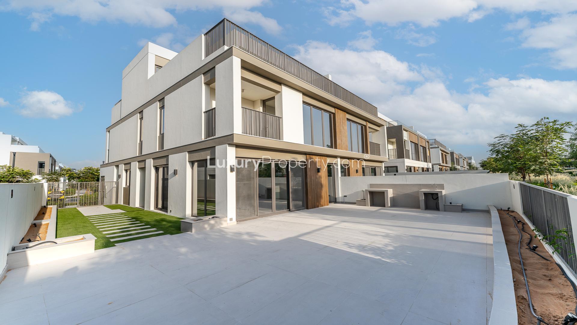 Chic 4-bedroom villa exterior in Tilal Al Ghaf's Aura community