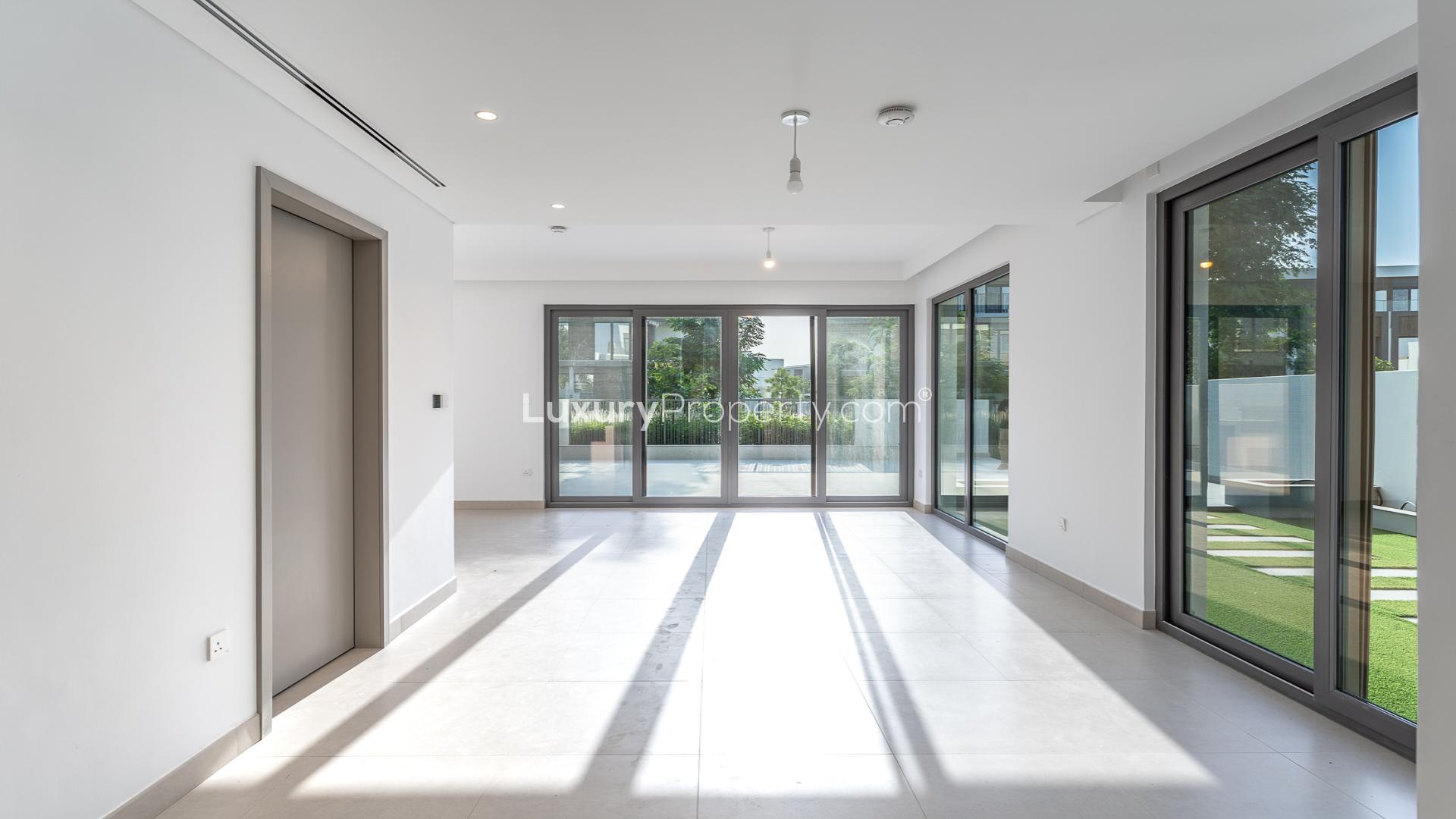 Chic 4-bedroom villa exterior in Tilal Al Ghaf's Aura community, available for rent