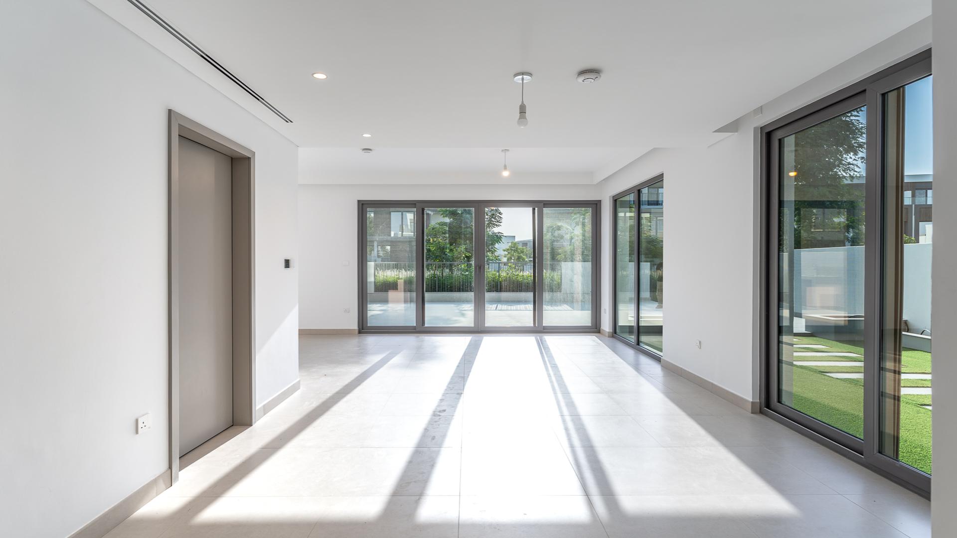 Chic 4-bedroom villa exterior in Tilal Al Ghaf's Aura community, available for rent