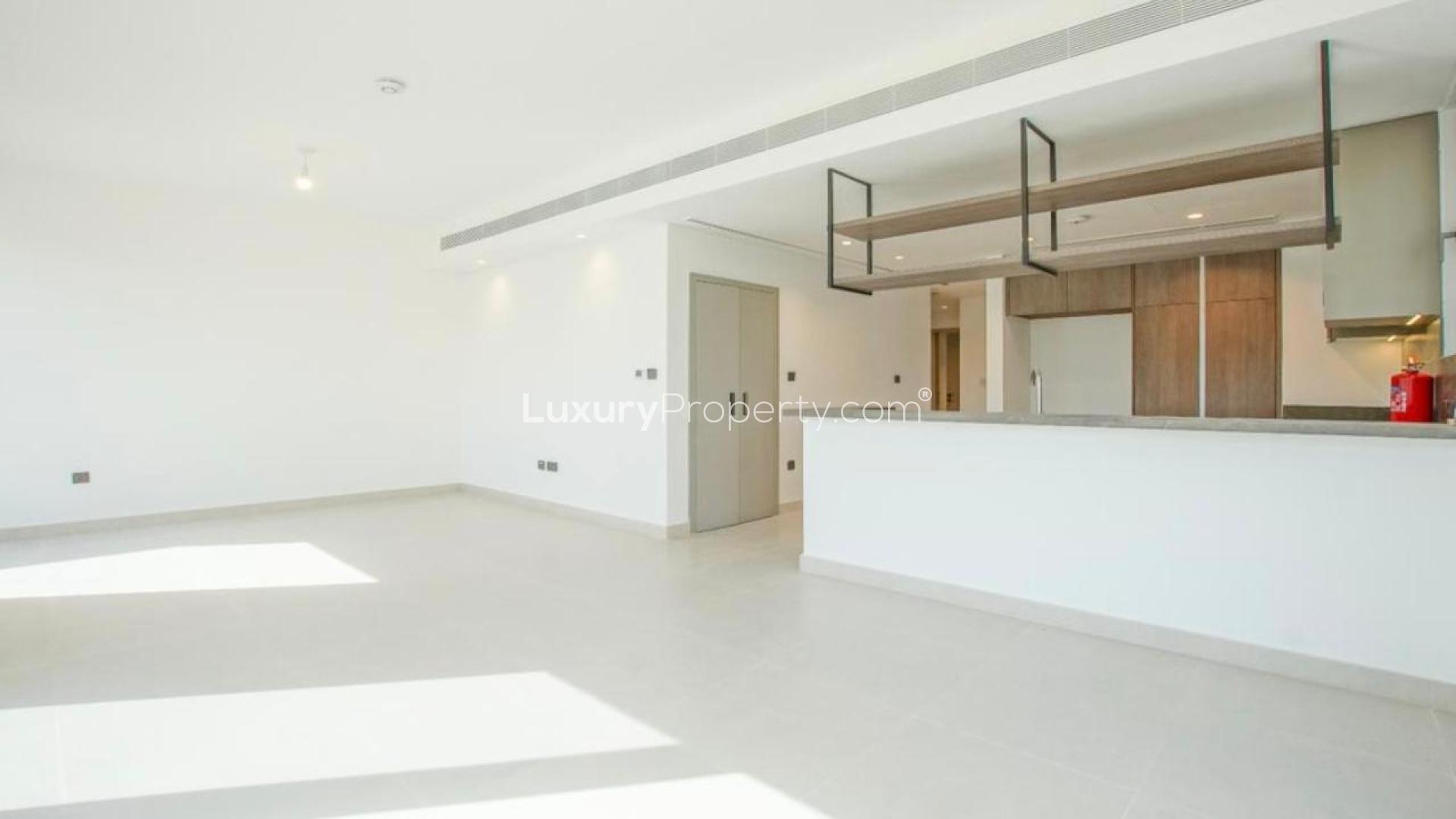 Bright living area in single-row villa, Aura 2, Tilal Al Ghaf, with garden view