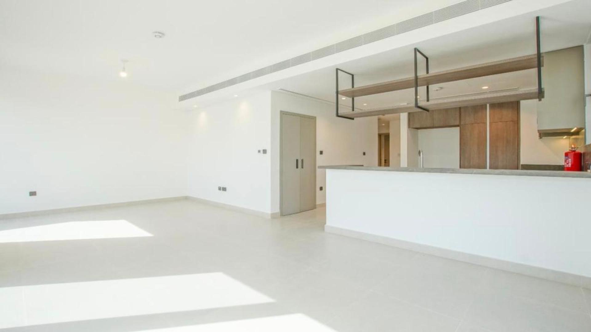 Bright living area in single-row villa, Aura 2, Tilal Al Ghaf, with garden view