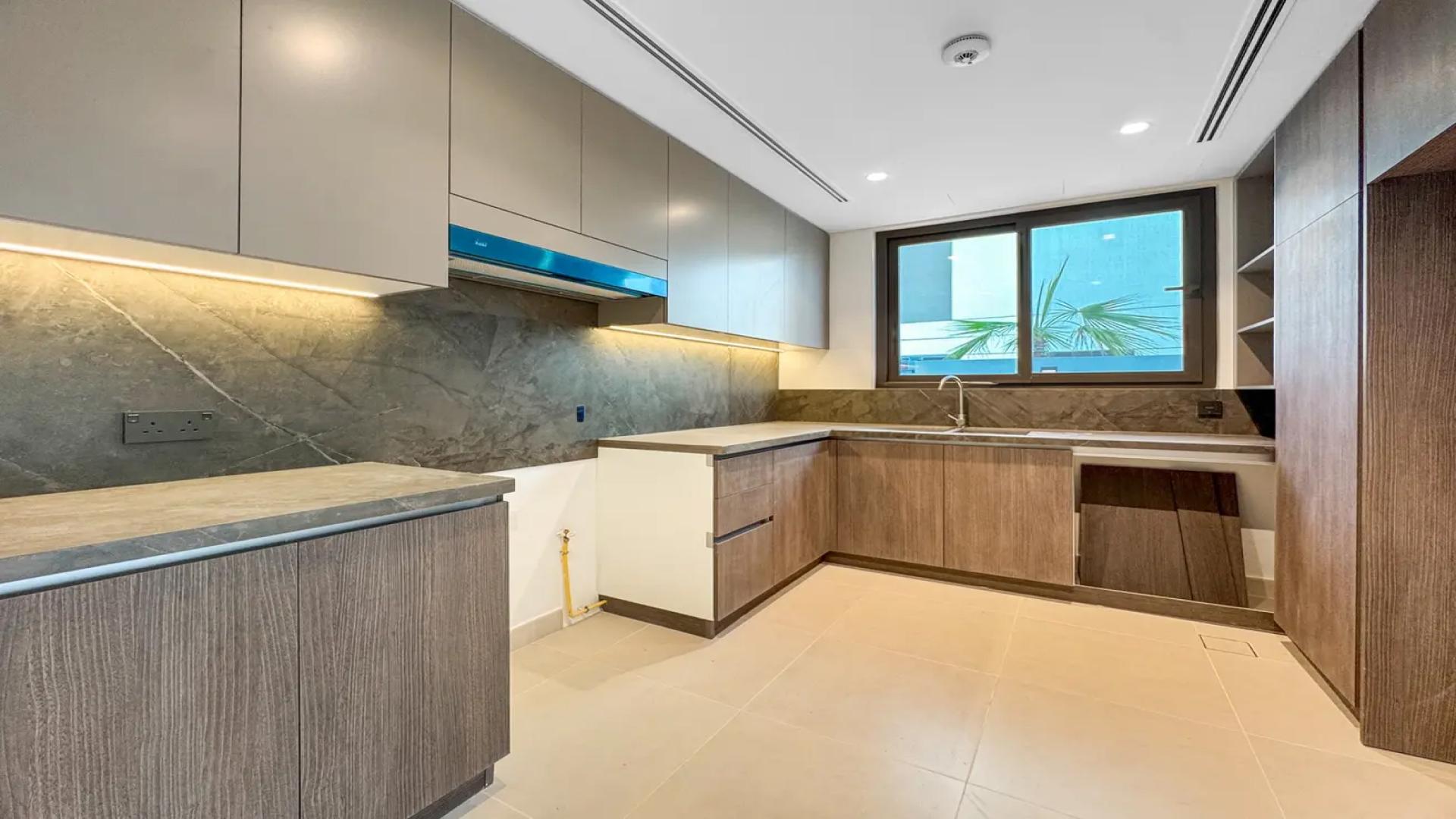 Bright, spacious living area in 4-bedroom villa for rent, Aura, Tilal Al Ghaf