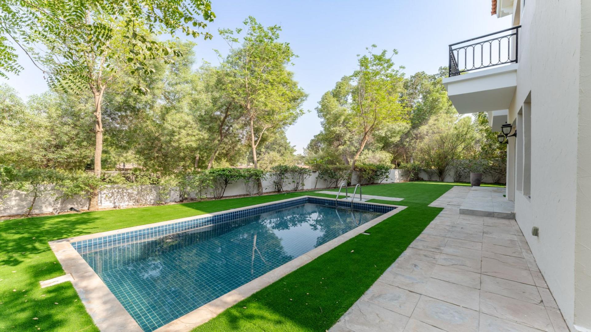 Upgraded Jumeirah Golf Estates villa with private pool and lush garden views for rent