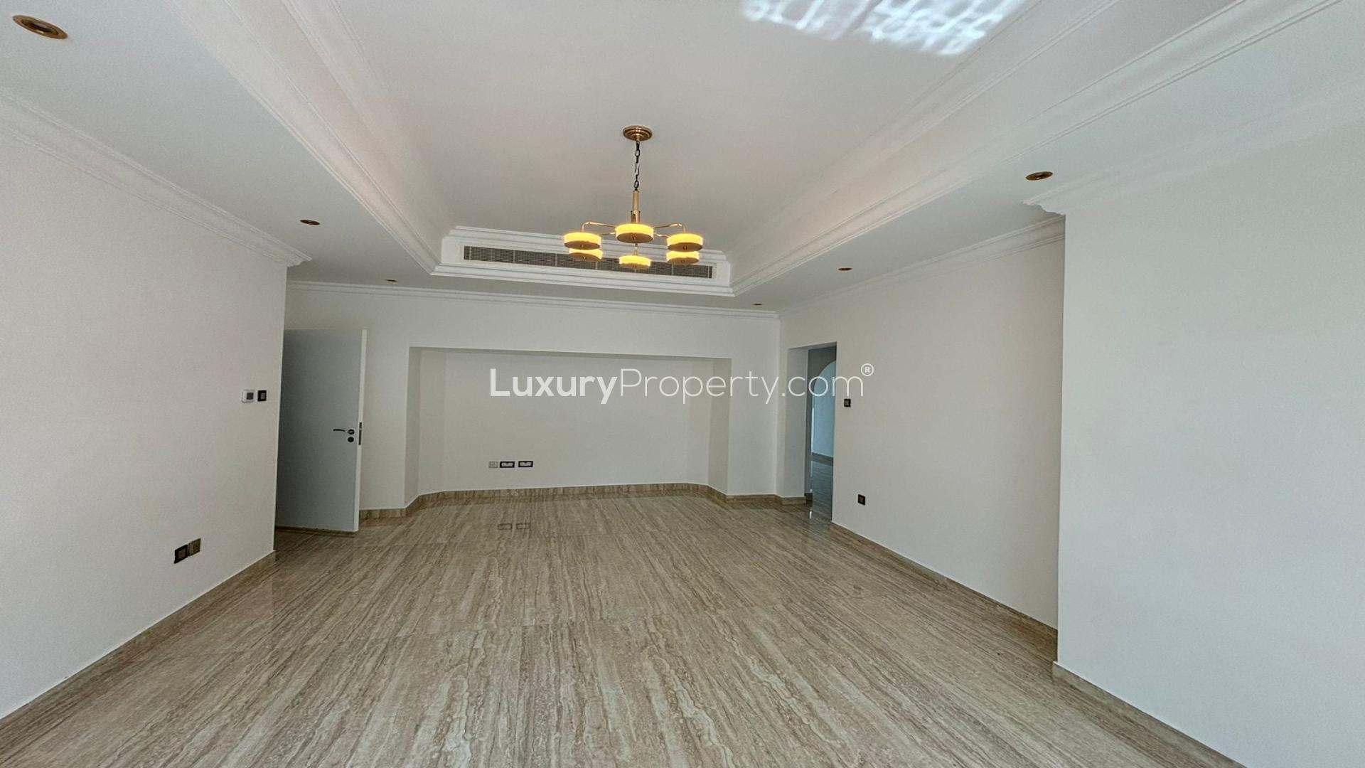 Spacious living room in 4-bedroom villa, Jumeirah Islands, Mediterranean Clusters, marble flooring