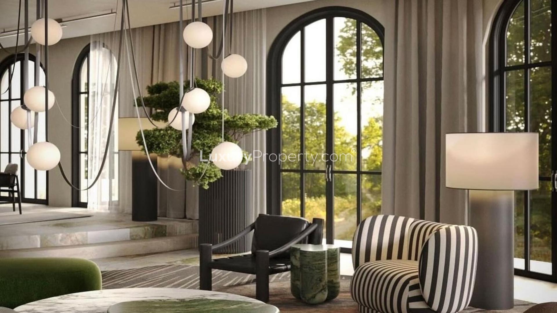 Stylish living room in Jumeirah Islands villa with modern decor and large windows