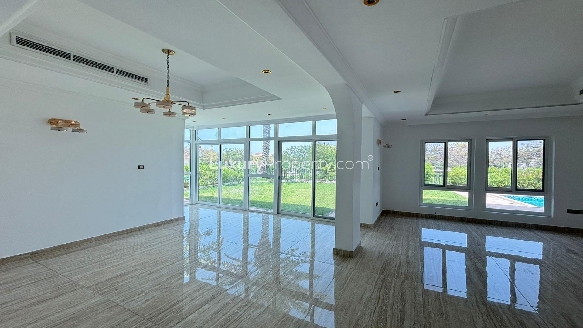 Spacious interior of four-bedroom villa in Jumeirah Islands' Mediterranean Clusters, marble flooring