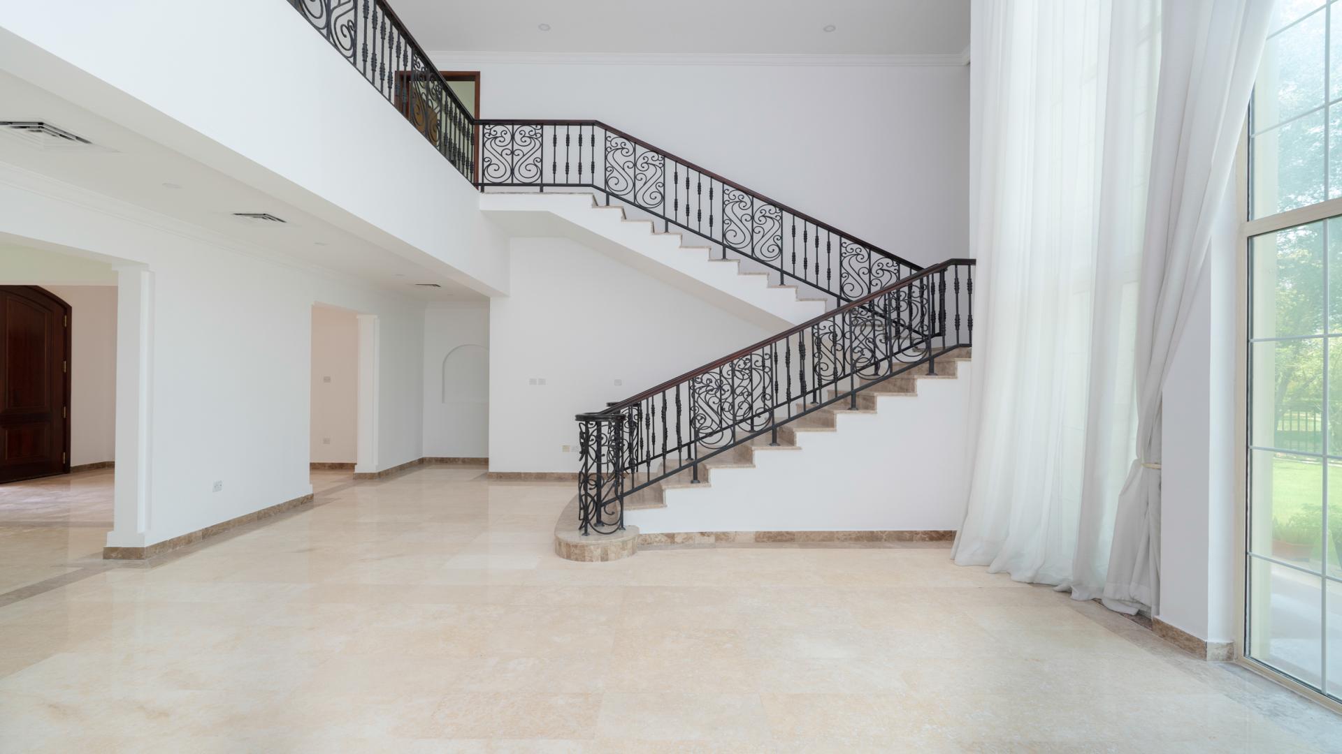 Luxury villa exterior with large windows in Jumeirah Islands, Mediterranean Clusters